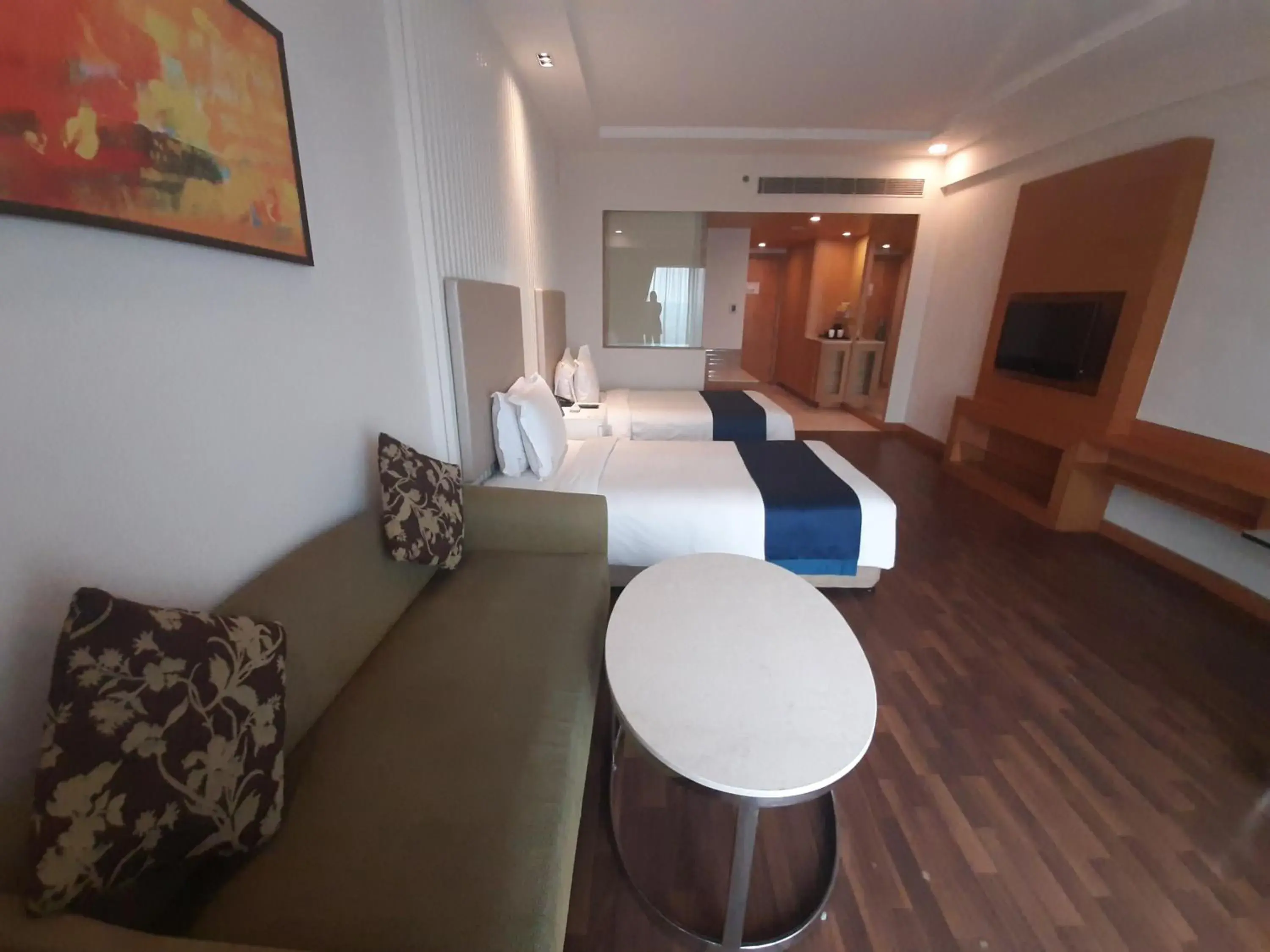 Bed, Seating Area in Holiday Inn Amritsar Ranjit Avenue, an IHG Hotel