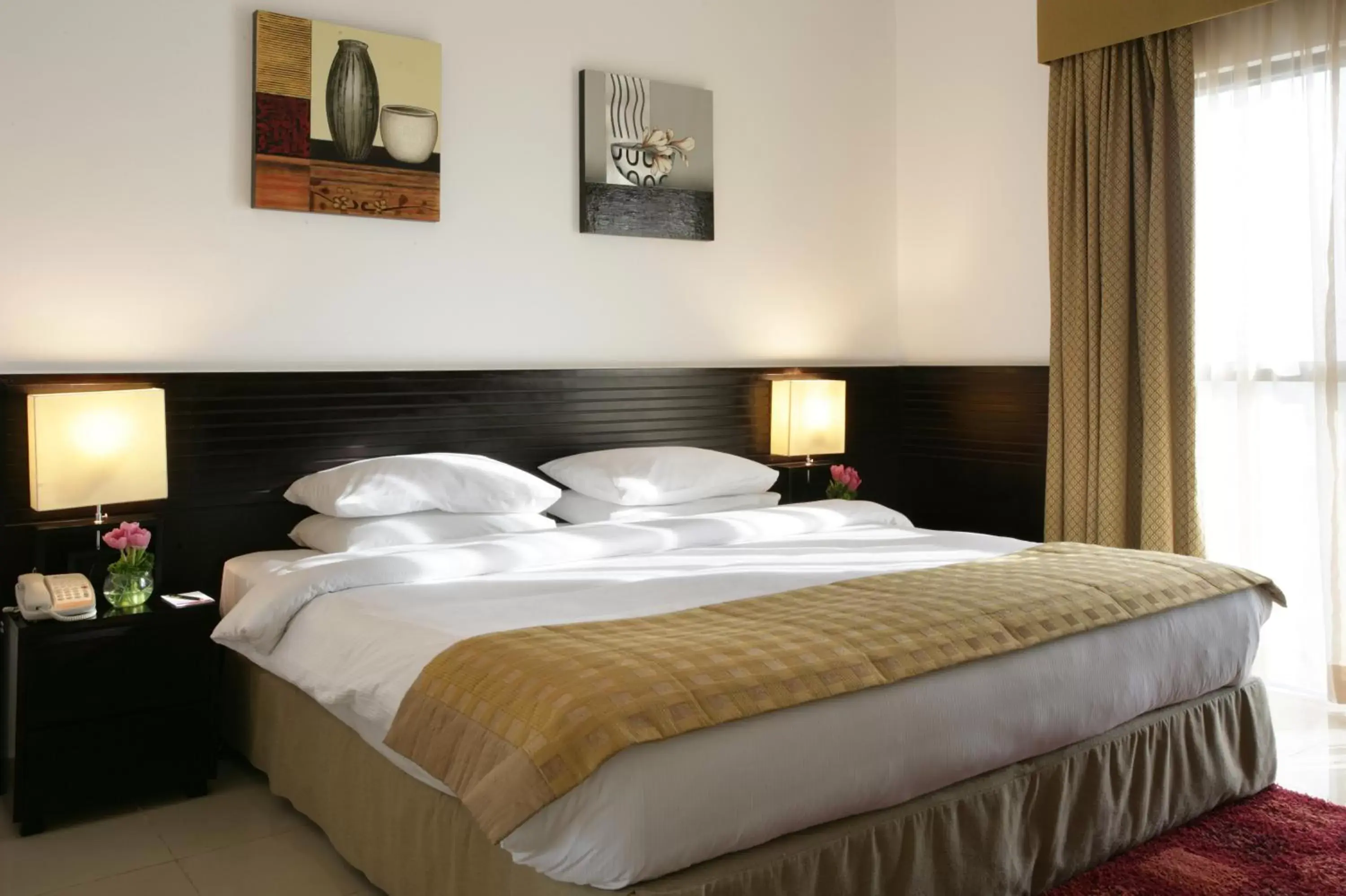 Bedroom, Bed in Ramada Hotel & Suites by Wyndham Ajman