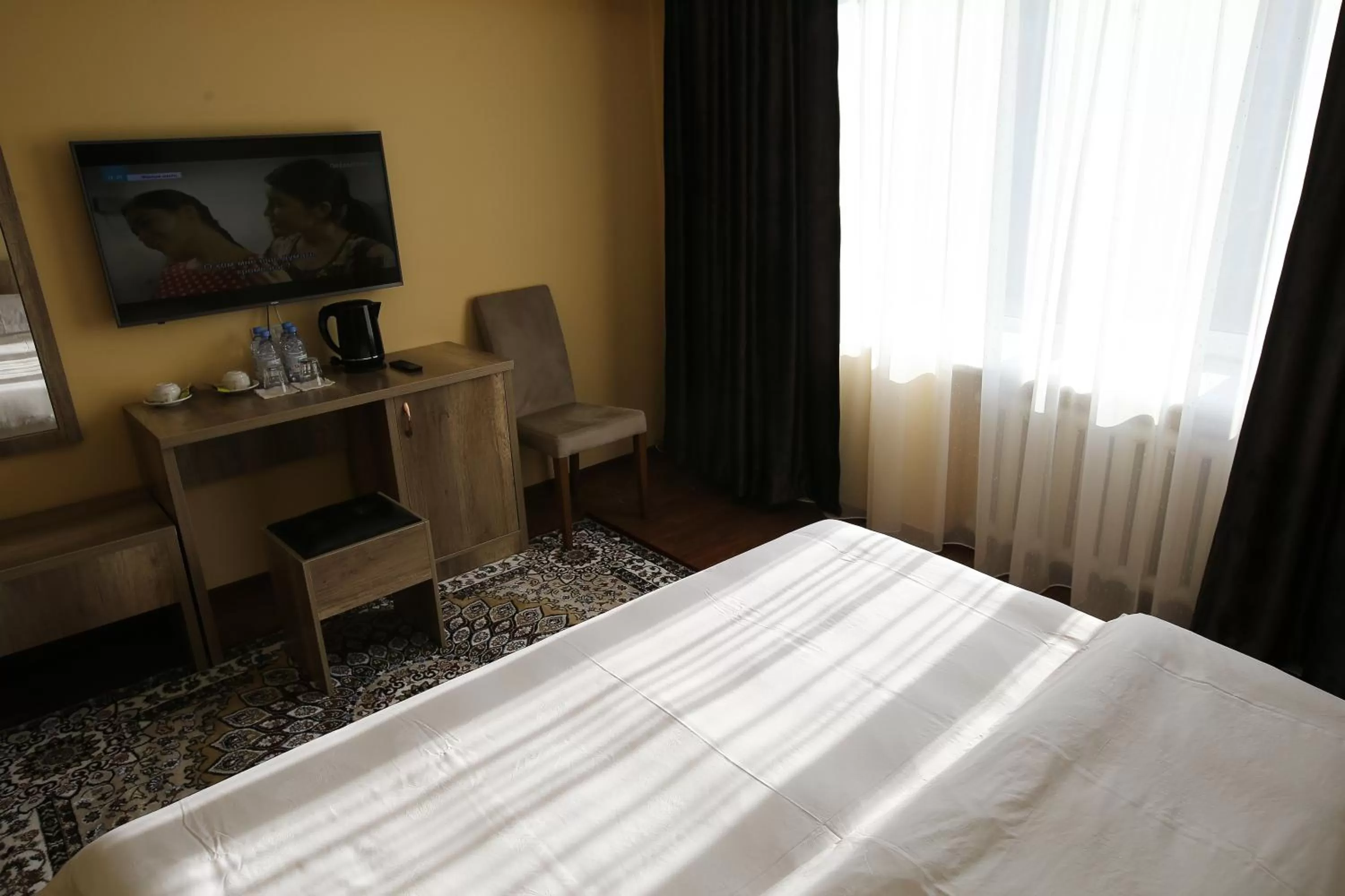 Bed in Altai Business Hotel