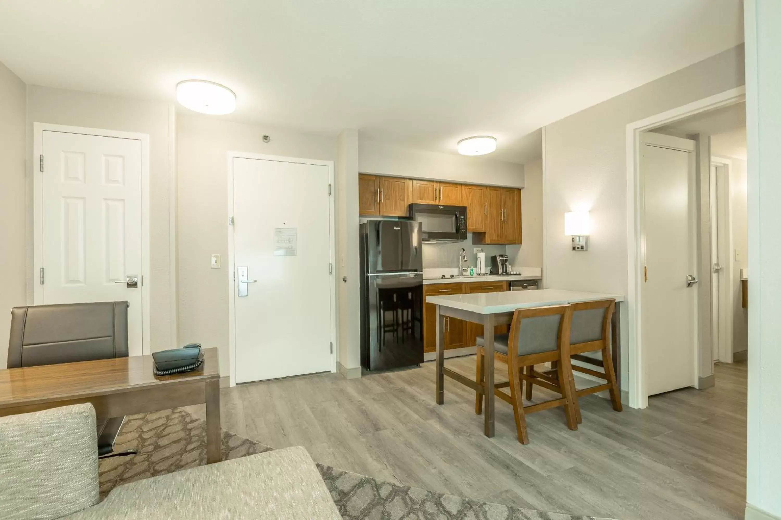 Photo of the whole room, Kitchen/Kitchenette in Holiday Inn Hotel and Suites Peachtree City, an IHG Hotel