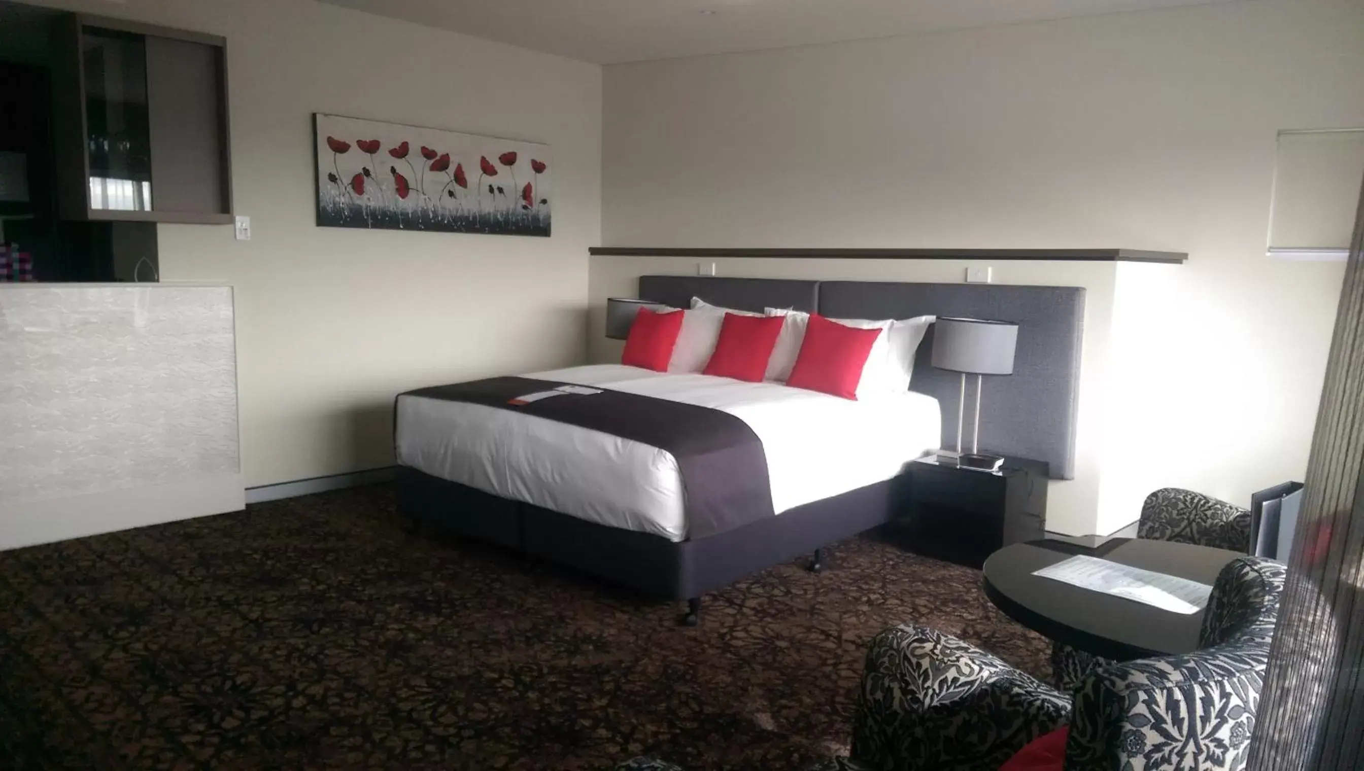 Photo of the whole room, Bed in Calamvale Hotel Suites and Conference Centre