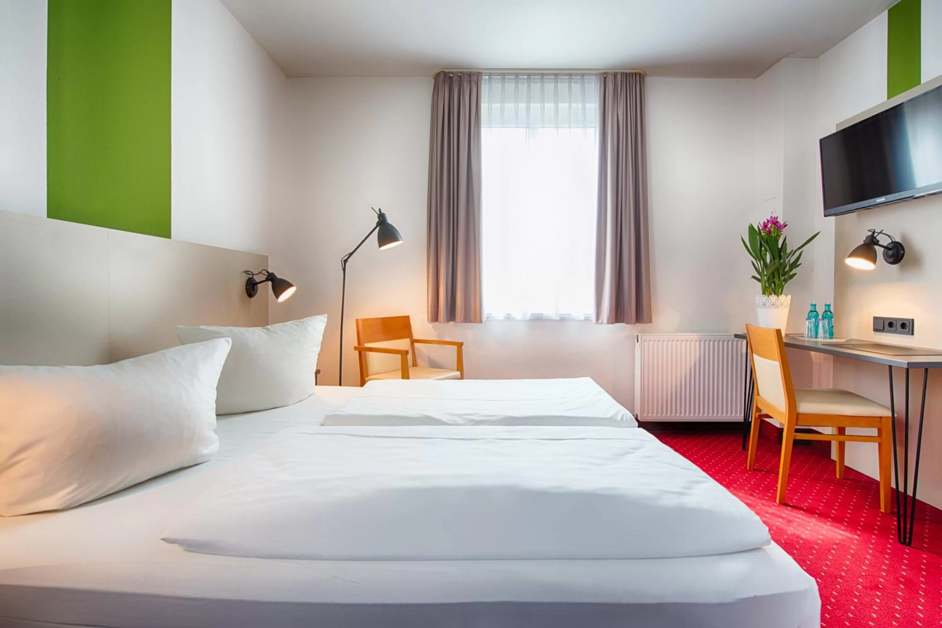 Photo of the whole room, Bed in ACHAT Hotel Chemnitz