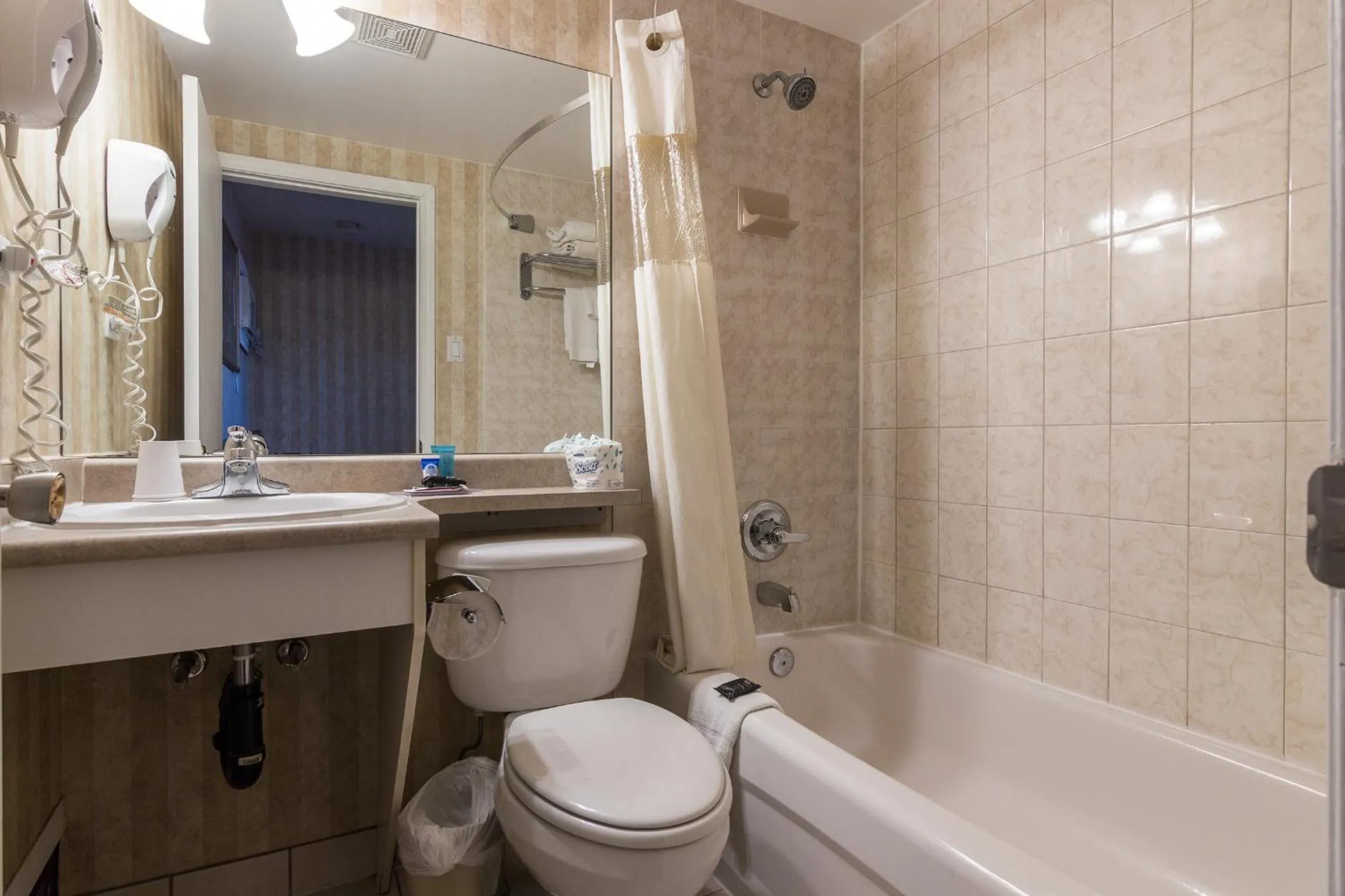 Bathroom in Canadas Best Value Inn Chinook Station