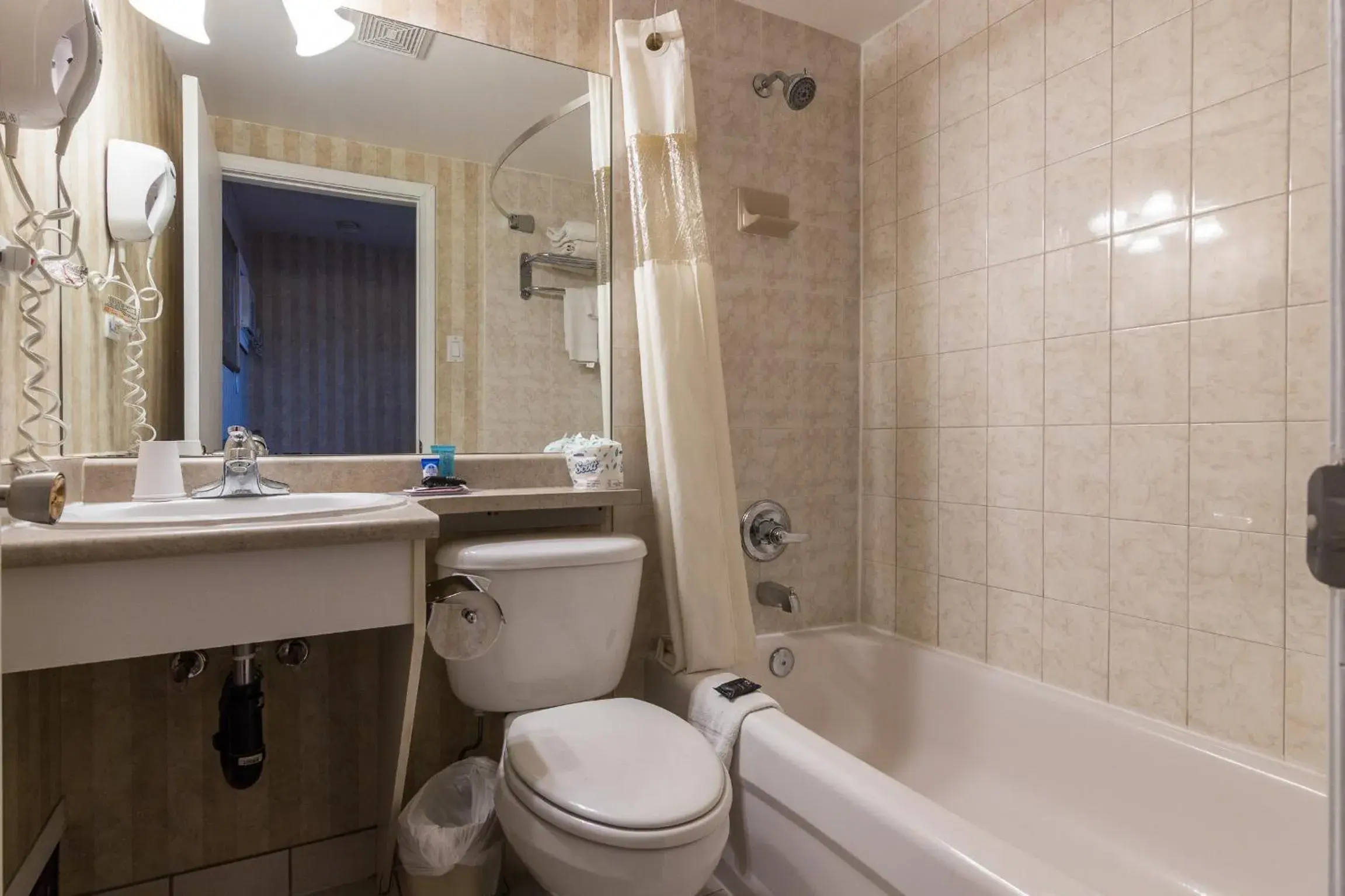Bathroom in Canadas Best Value Inn Chinook Station