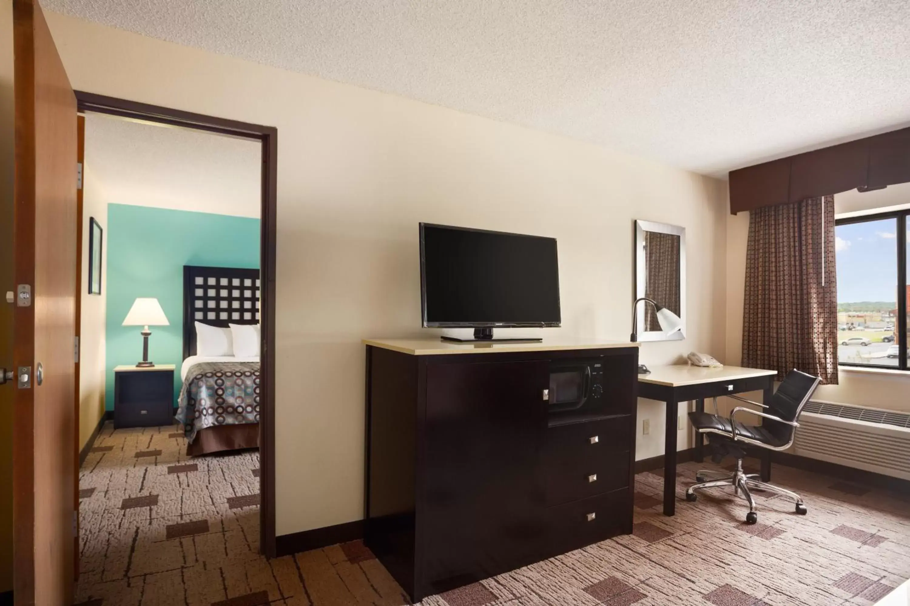 Day, TV/Entertainment Center in Days Inn by Wyndham Fort Smith