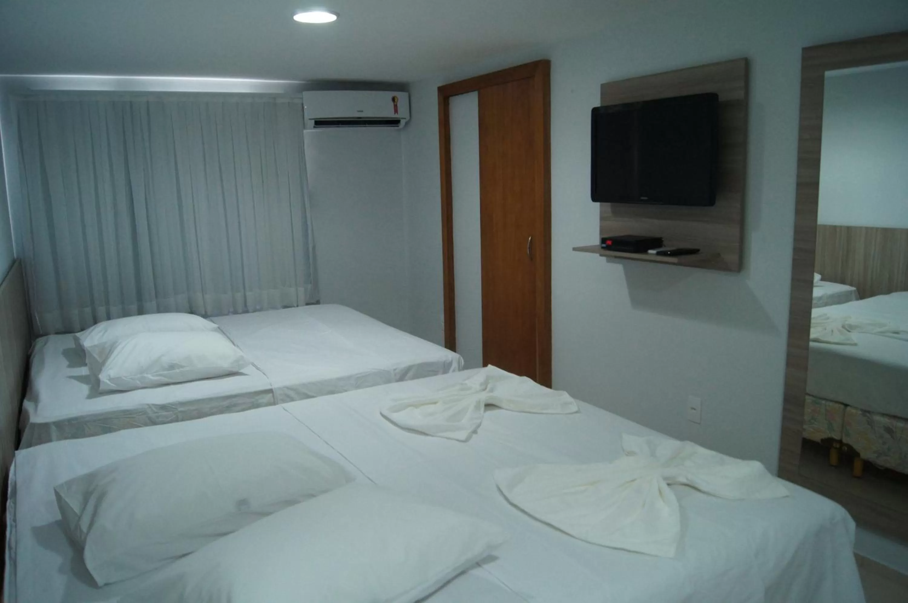 Bed in Hotel Fortaleza Inn