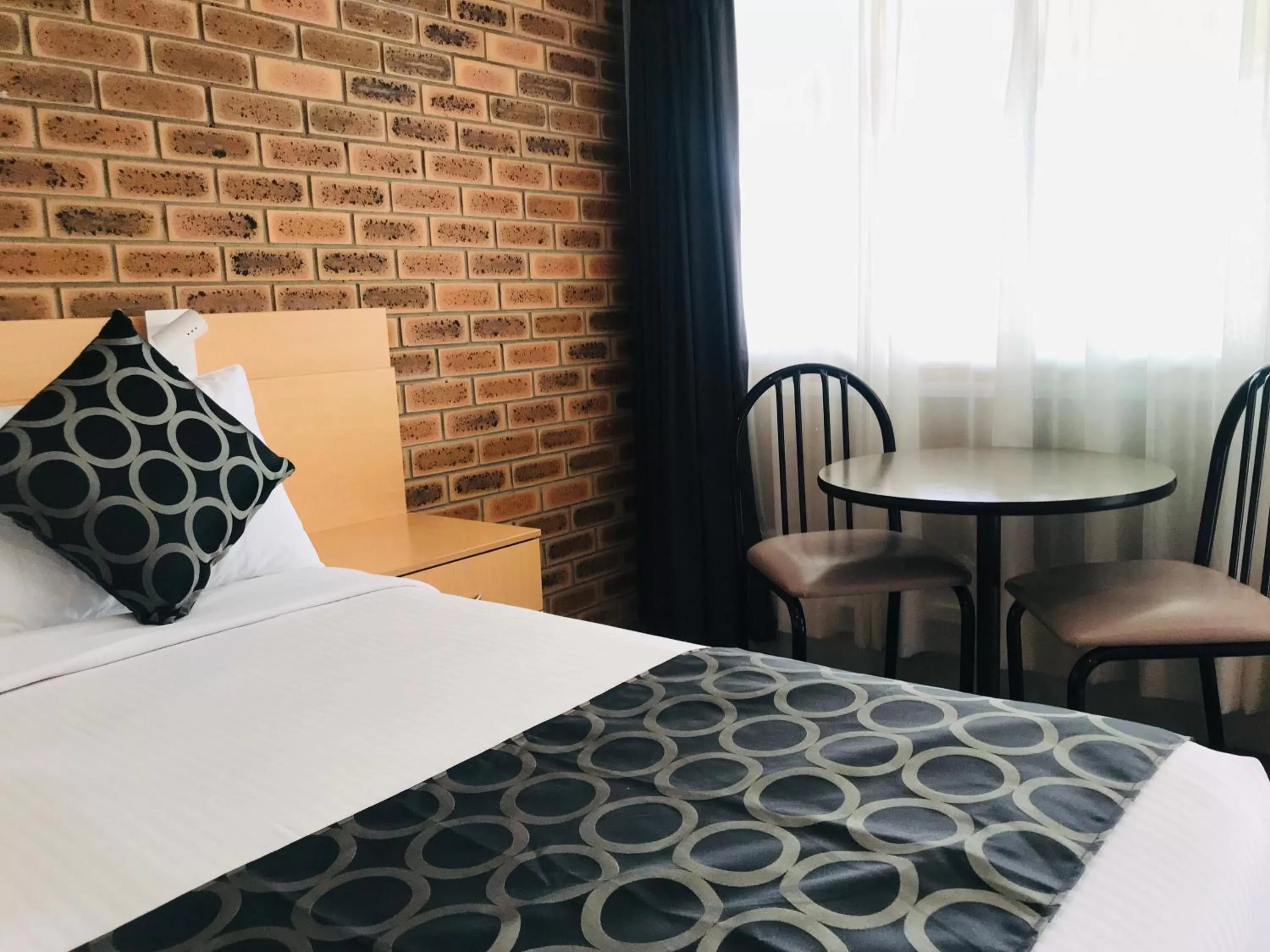 Bed in Jumbuck Motor Inn