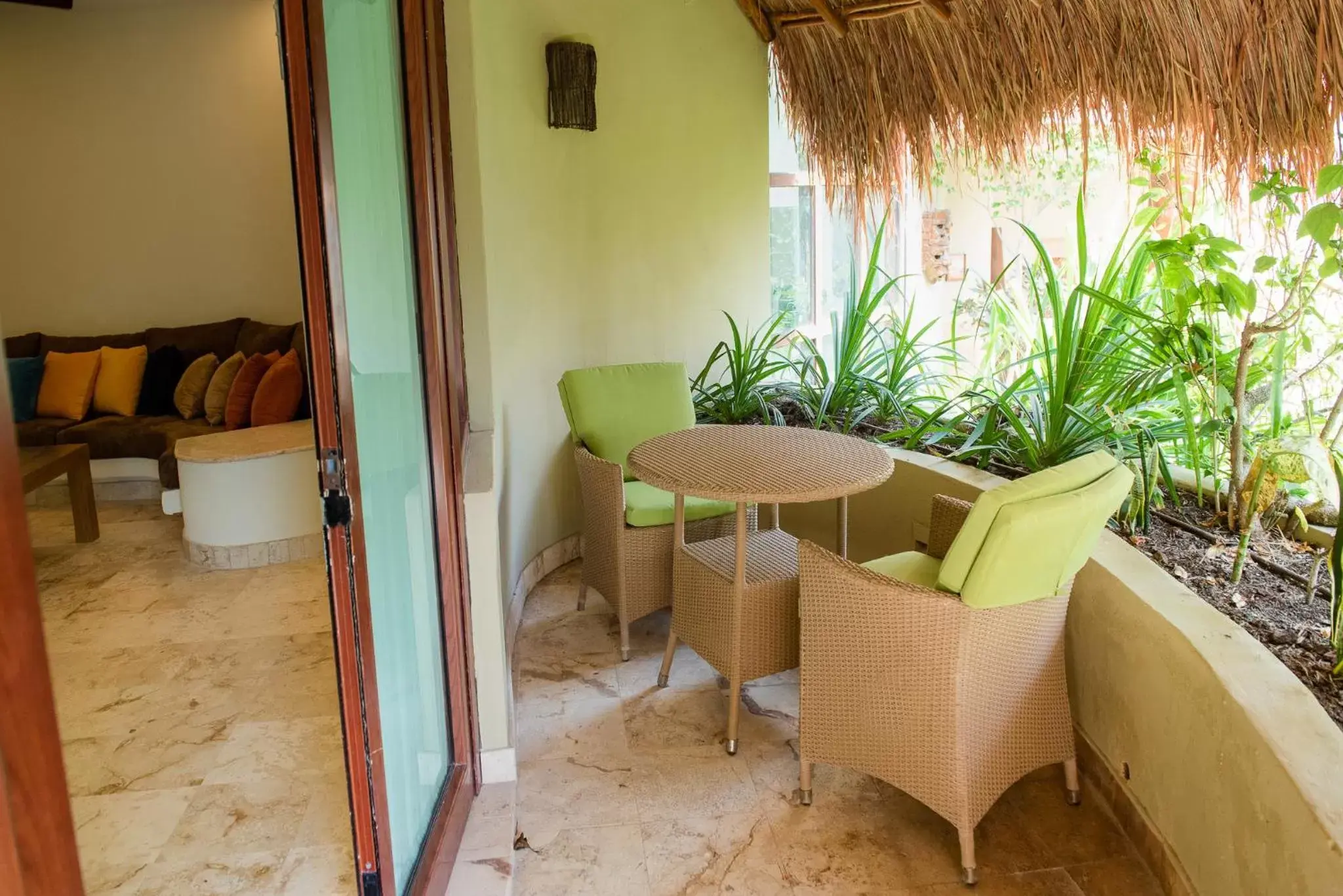Patio, Seating Area in Maya Villa Condo Hotel and Beachclub