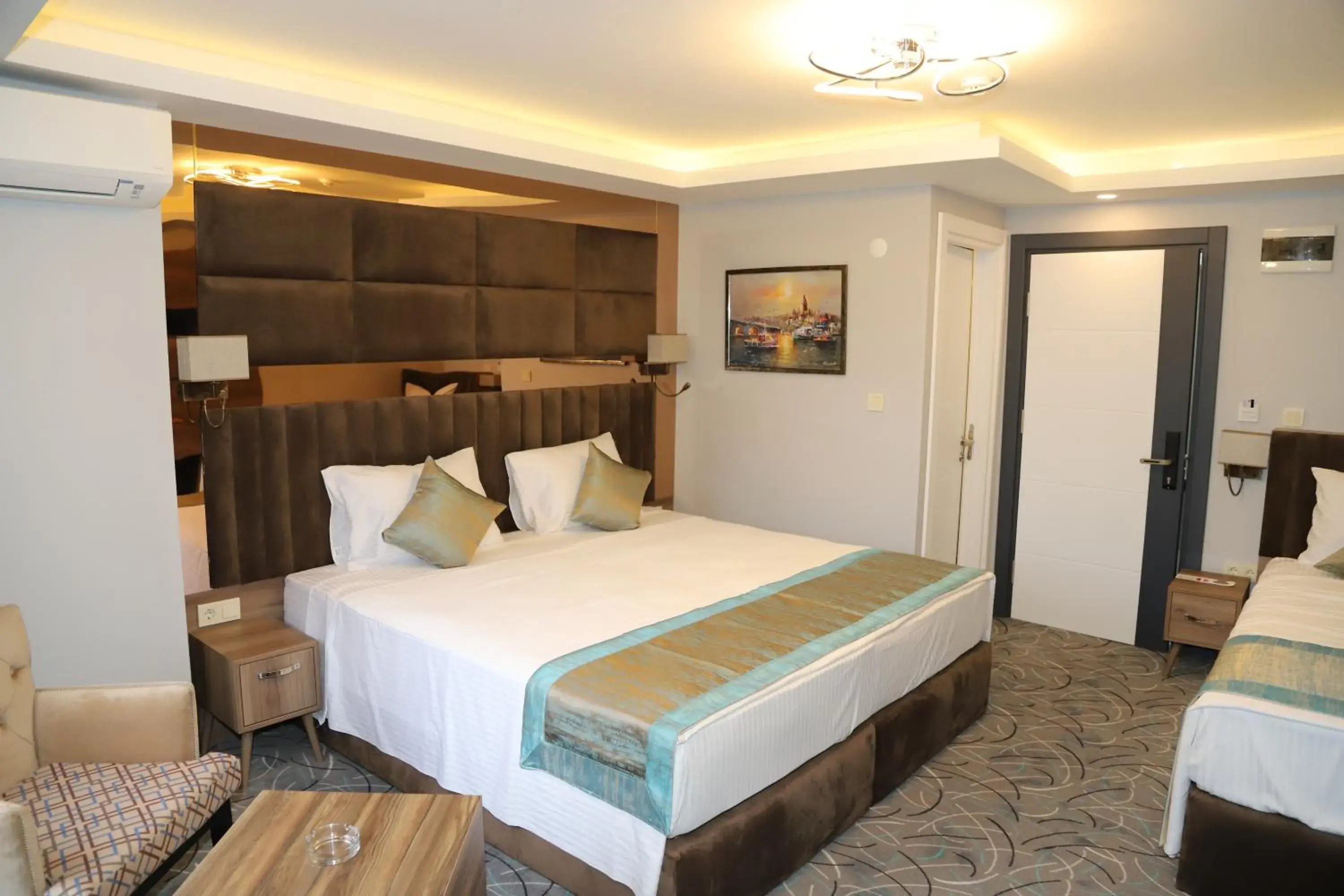 Photo of the whole room, Bed in Grand Kavi Hotel Photo of the whole room, Bed in Grand Kavi Hotel