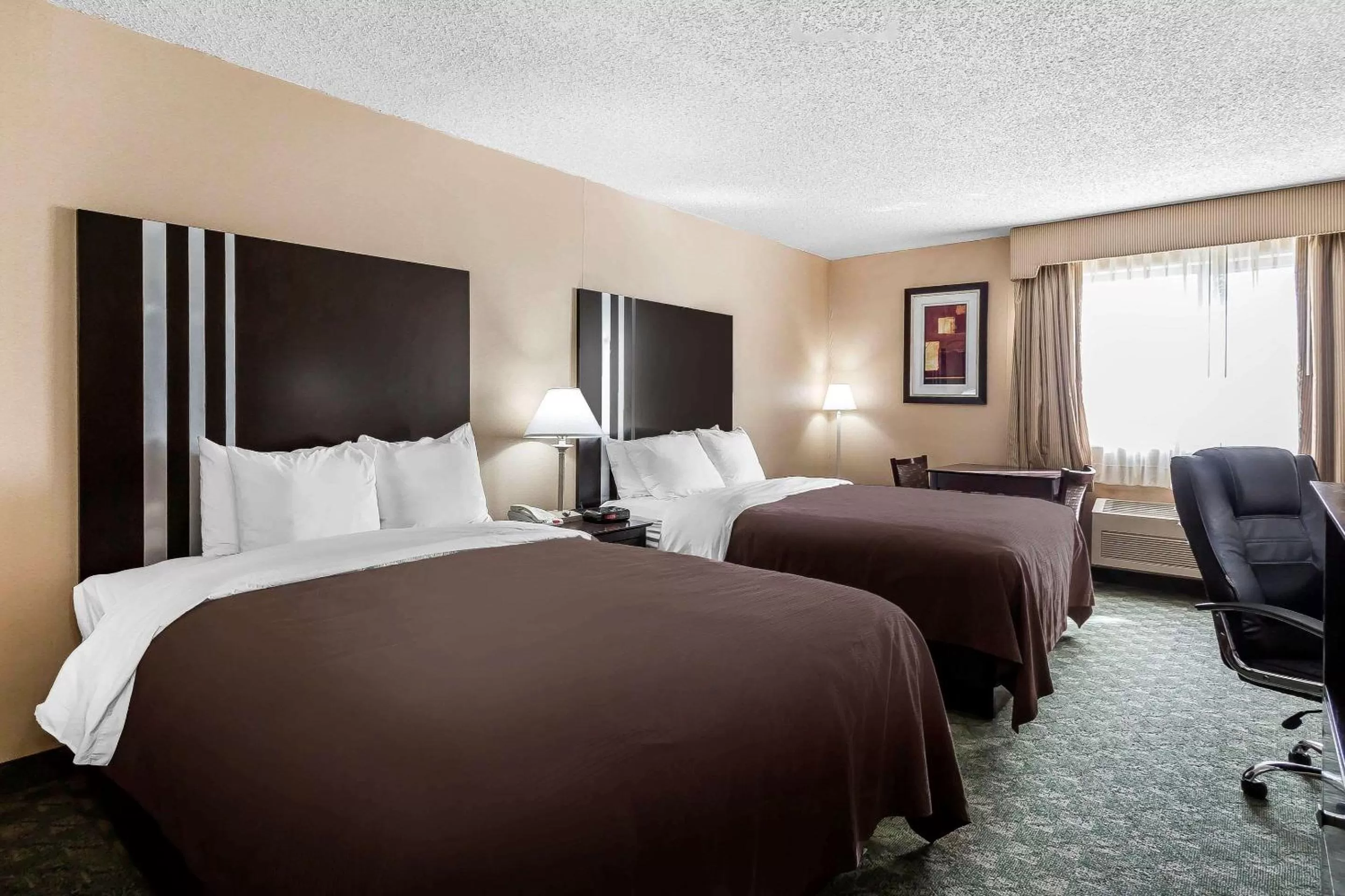 Photo of the whole room, Bed in Quality Inn Dumas