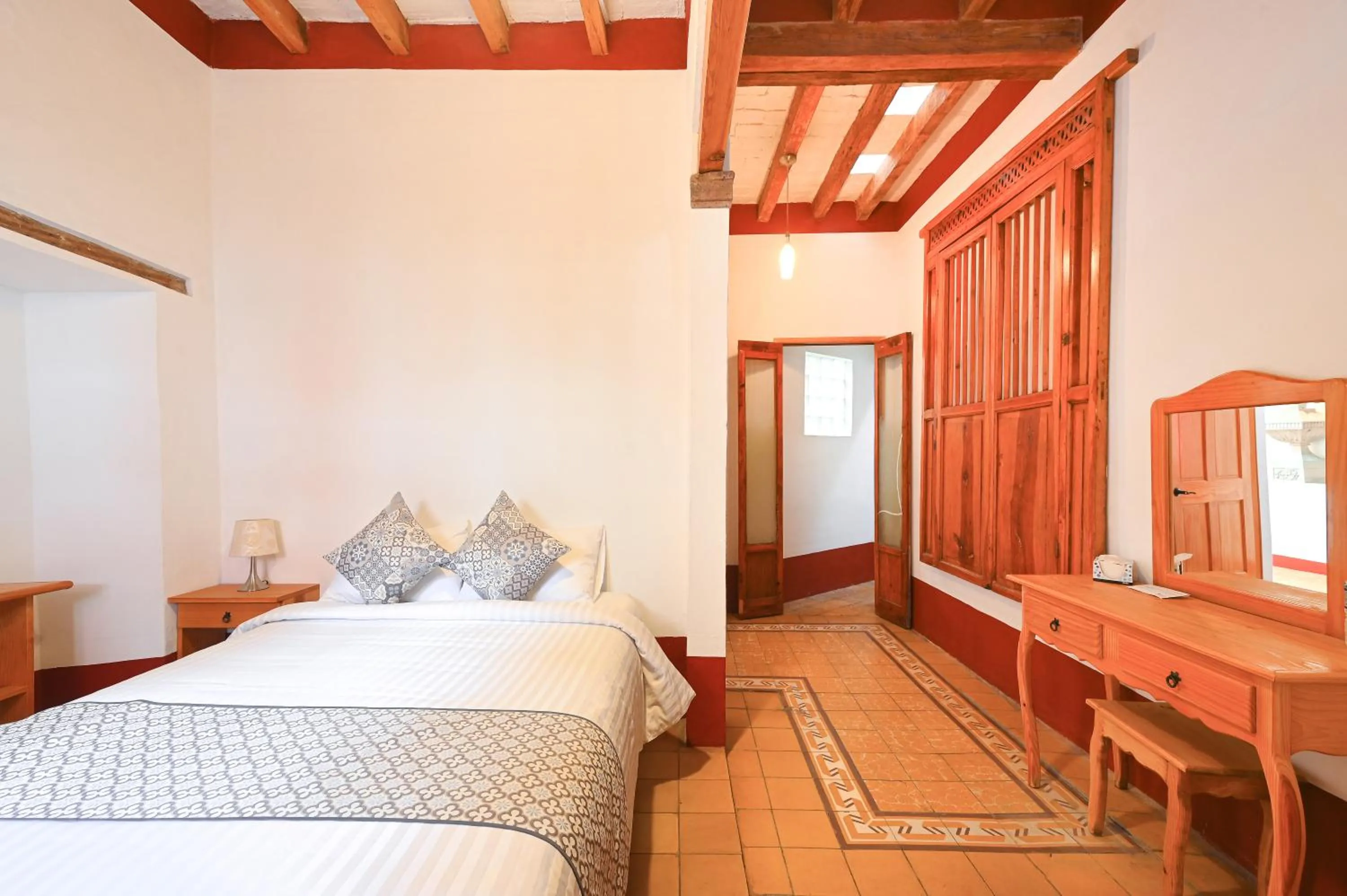 Bed in Hotel Meson Cuevano