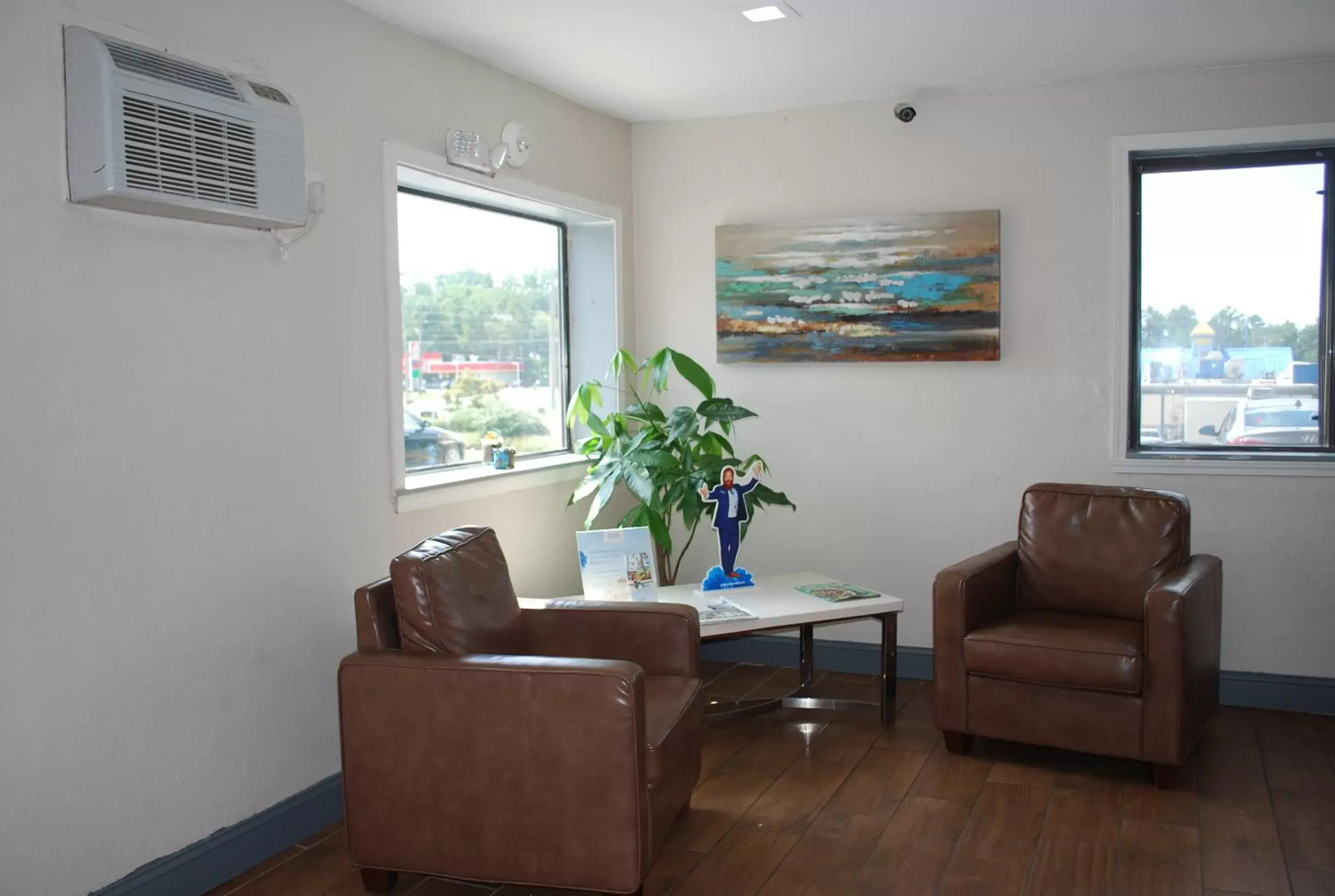 Lobby or reception in Super 8 by Wyndham Warner Robins Lobby or reception in Super 8 by Wyndham Warner Robins