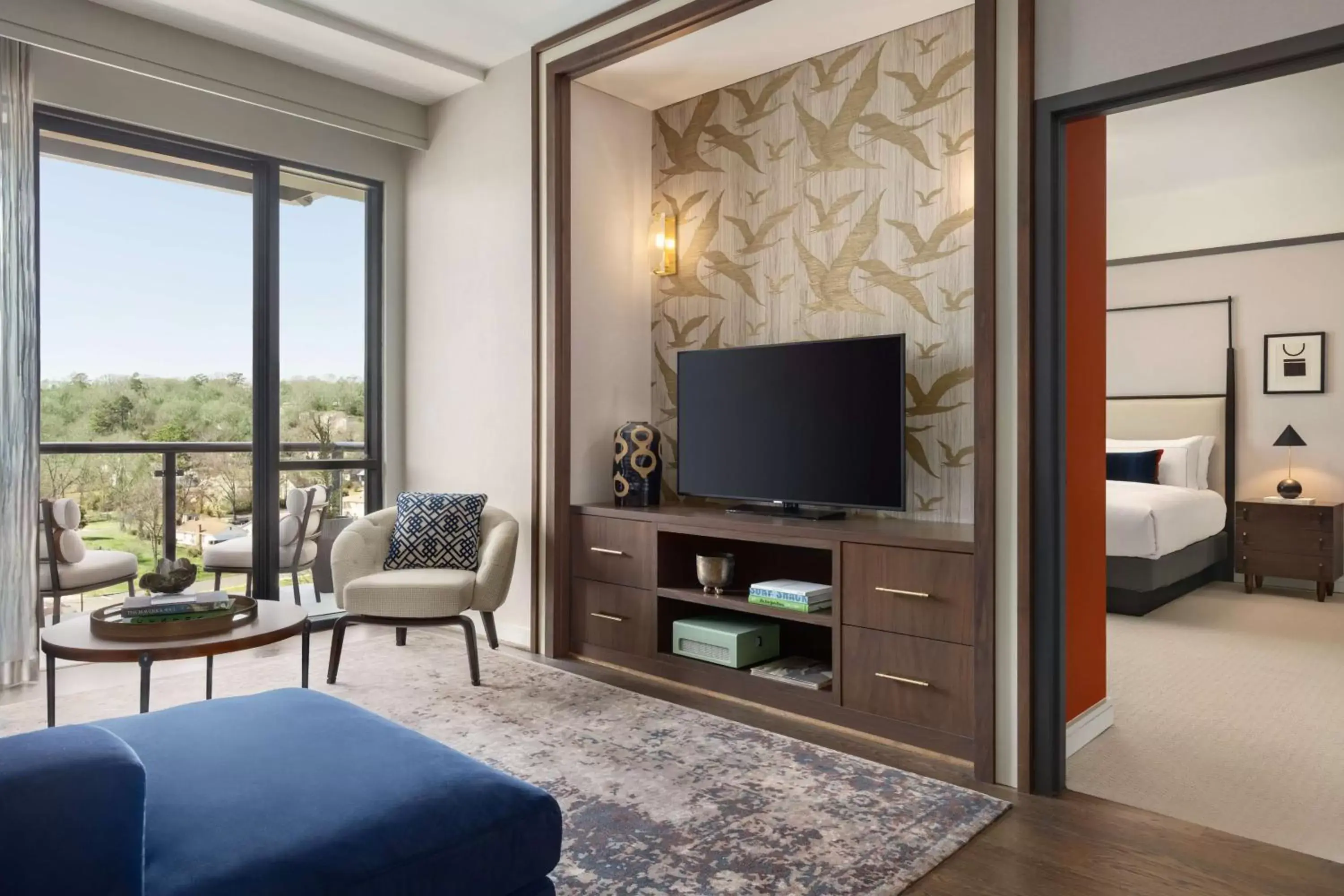 Living room, TV/Entertainment Center in Valley Hotel Homewood Birmingham - Curio Collection By Hilton
