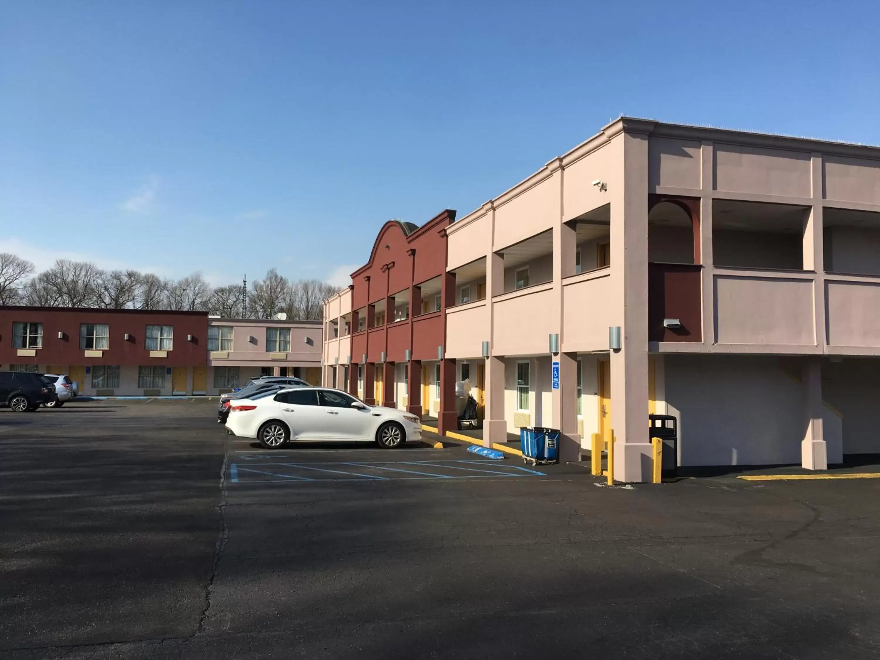 Parking, Property Building in Ramada by Wyndham Rockville Centre