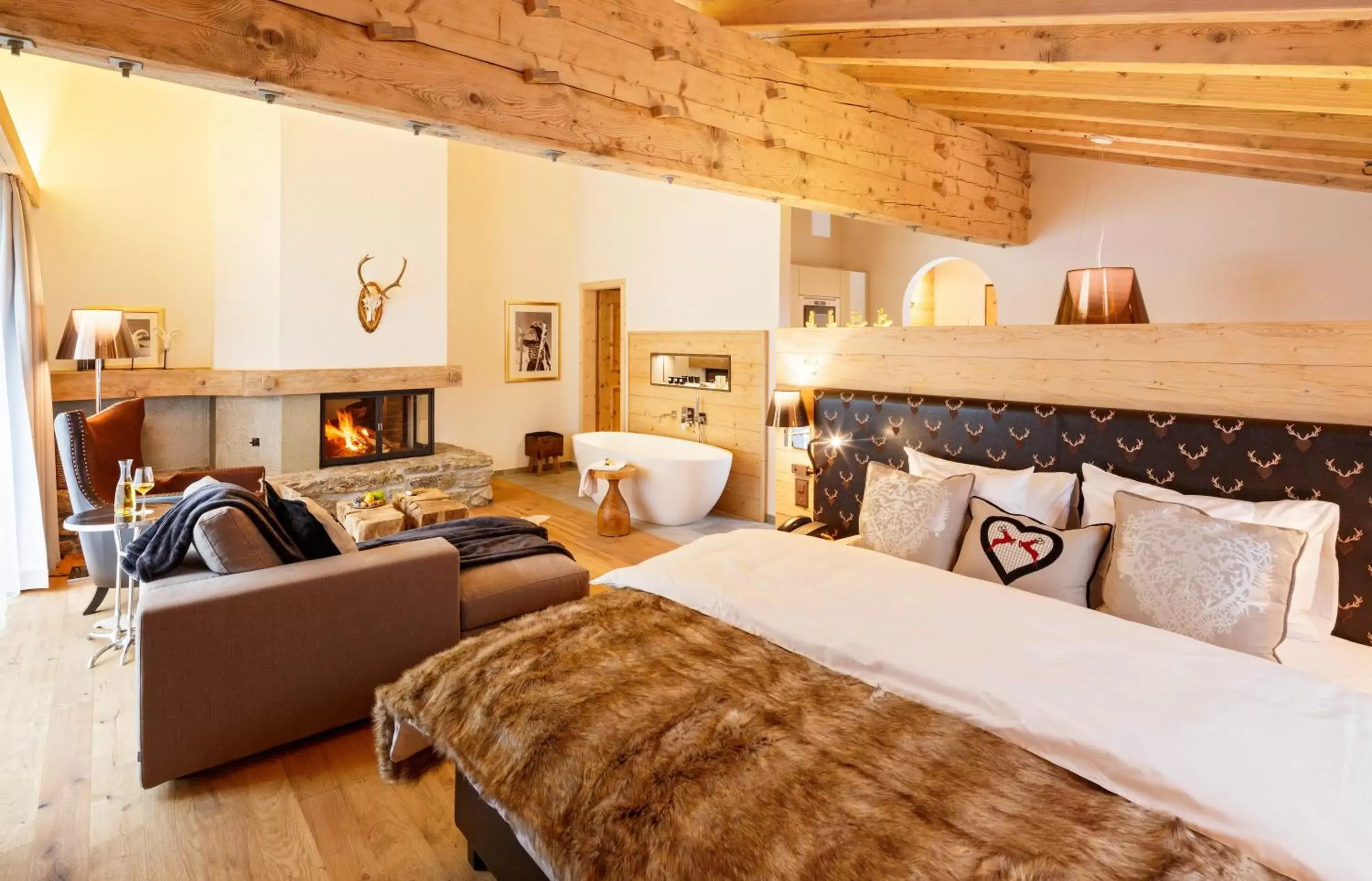 Bed, Seating Area in Hotel Piz Buin Klosters