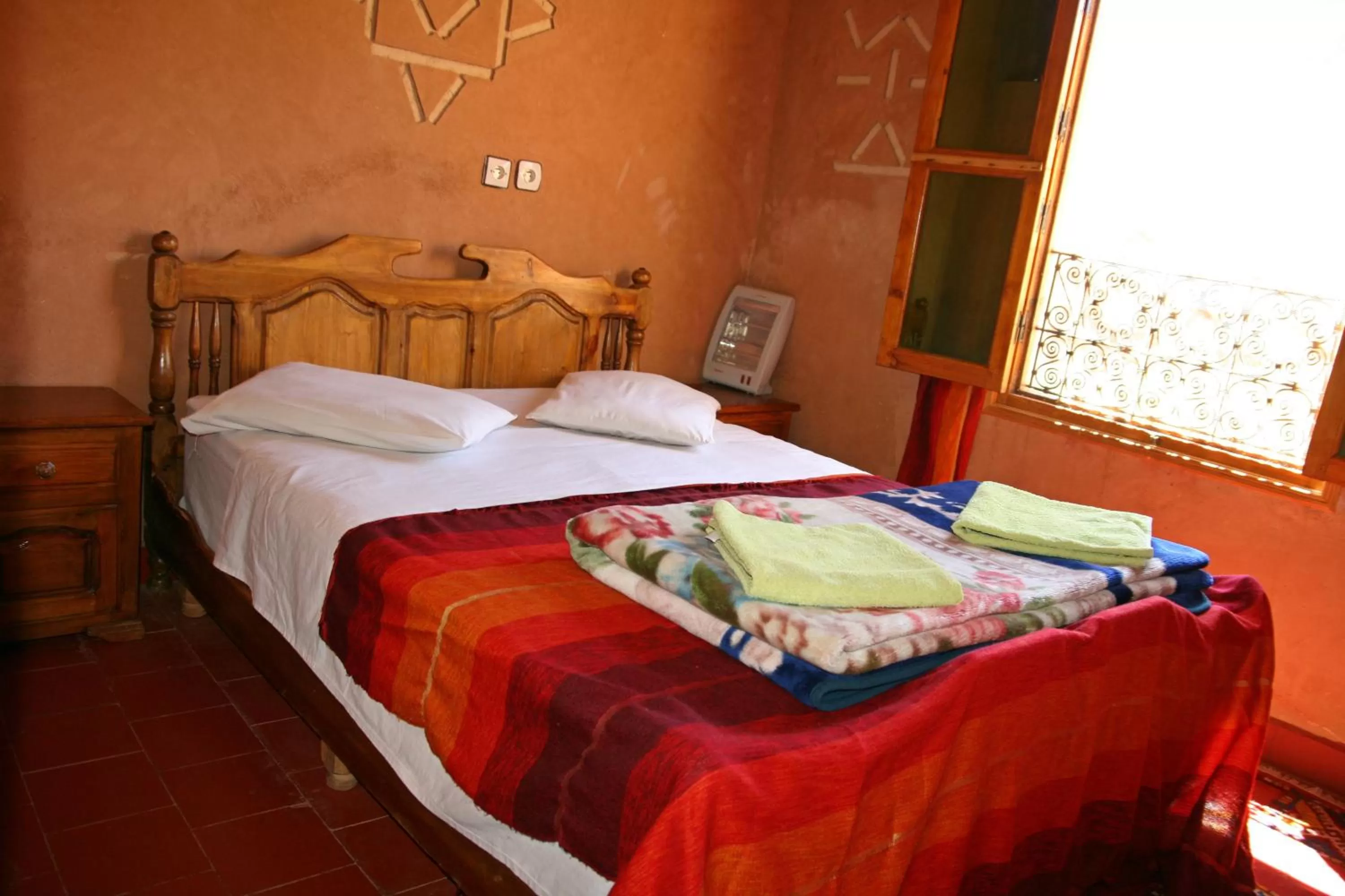 Bed in Maison d'Hôte Valentine