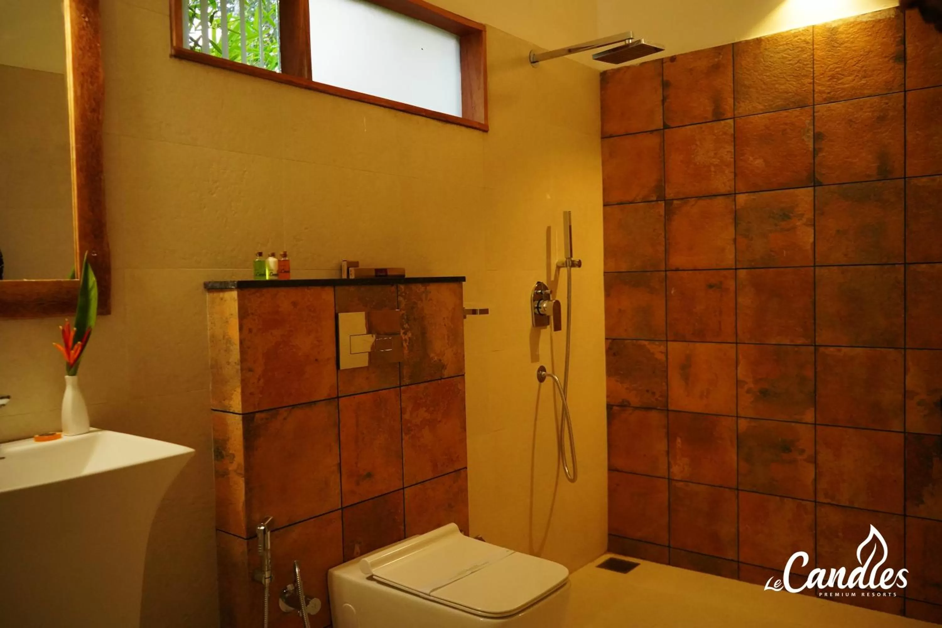 Bathroom in Le Candles Resort