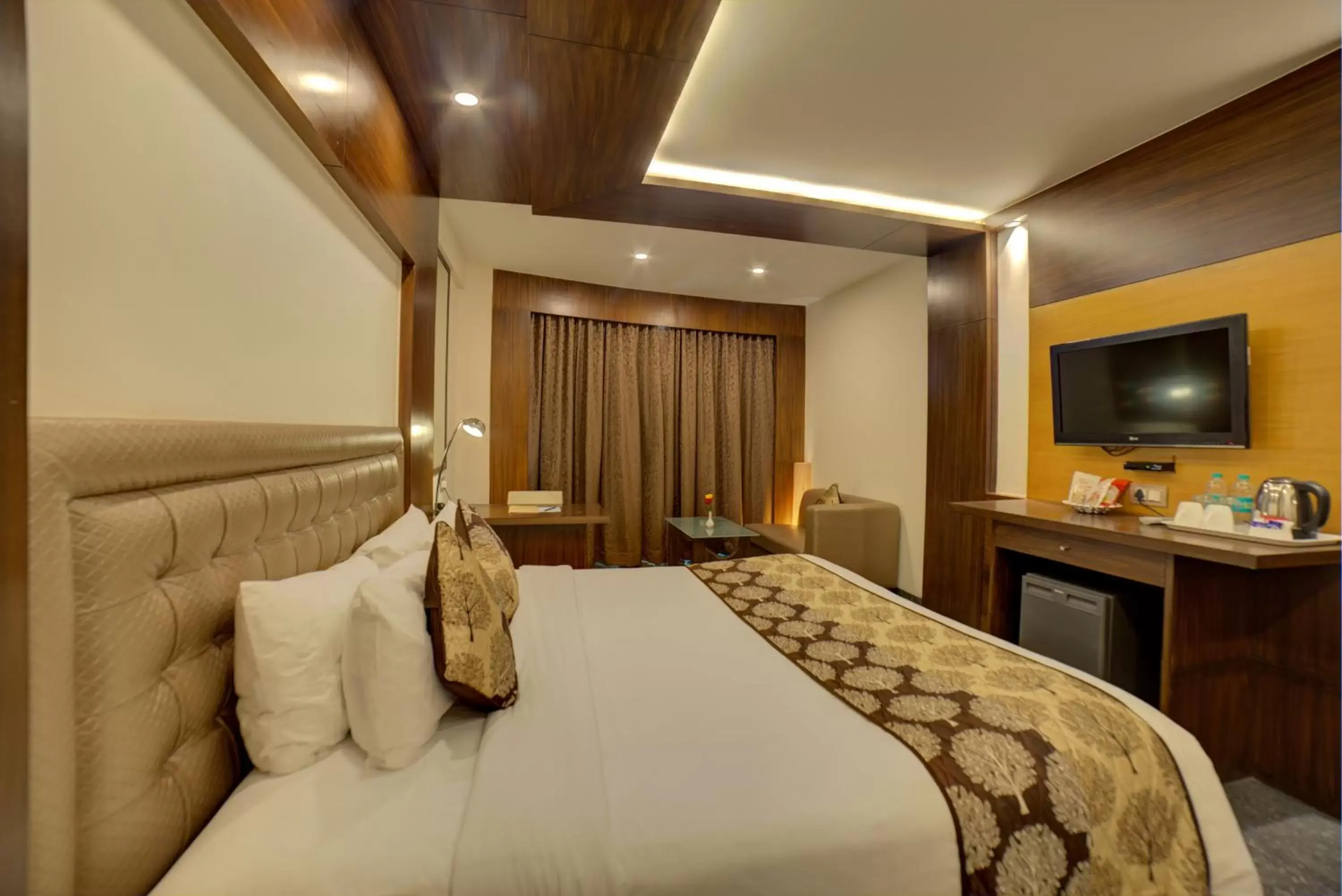 Bed in Goldfinch Hotel Mangalore