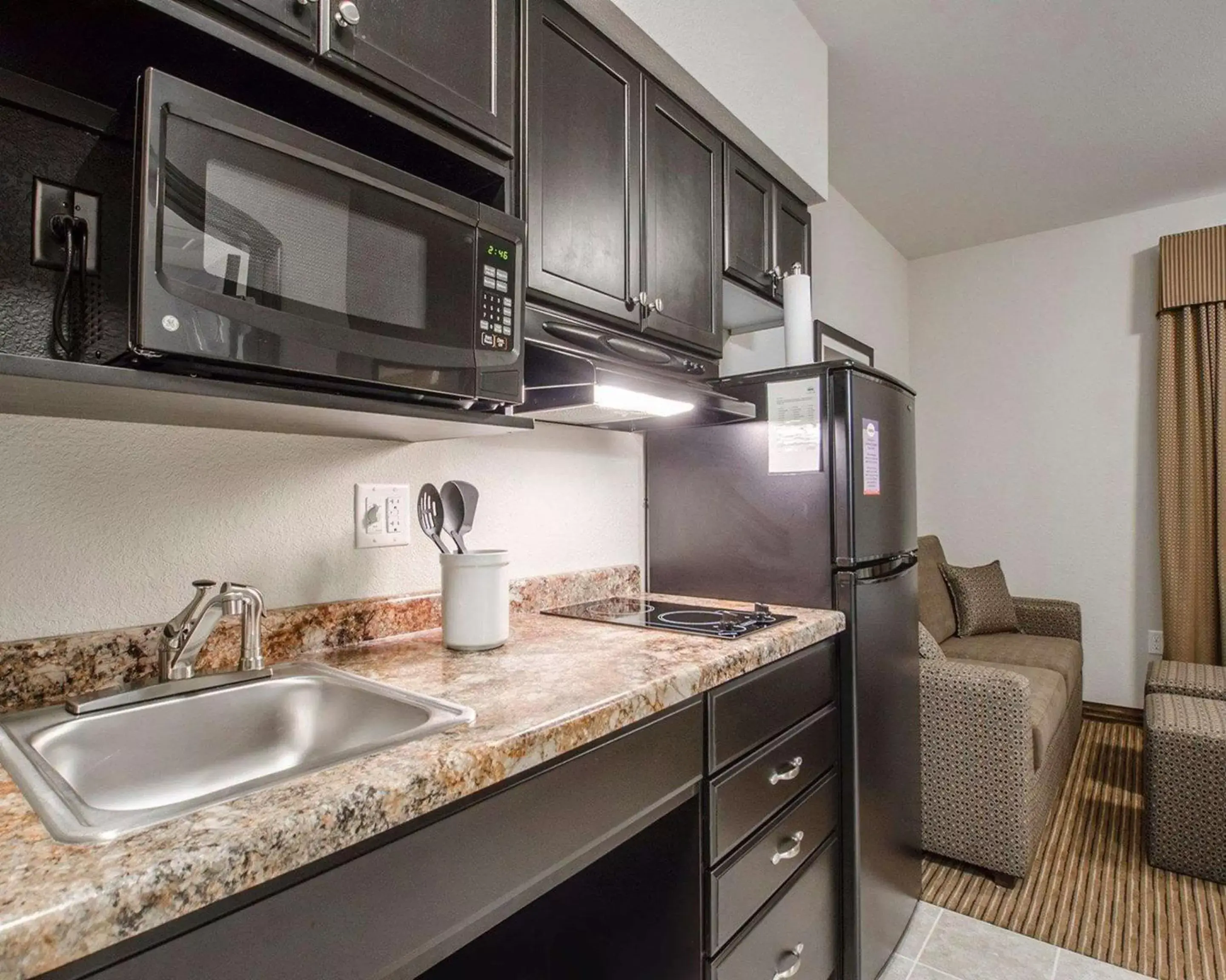 Photo of the whole room, Kitchen/Kitchenette in Quality Inn and Suites