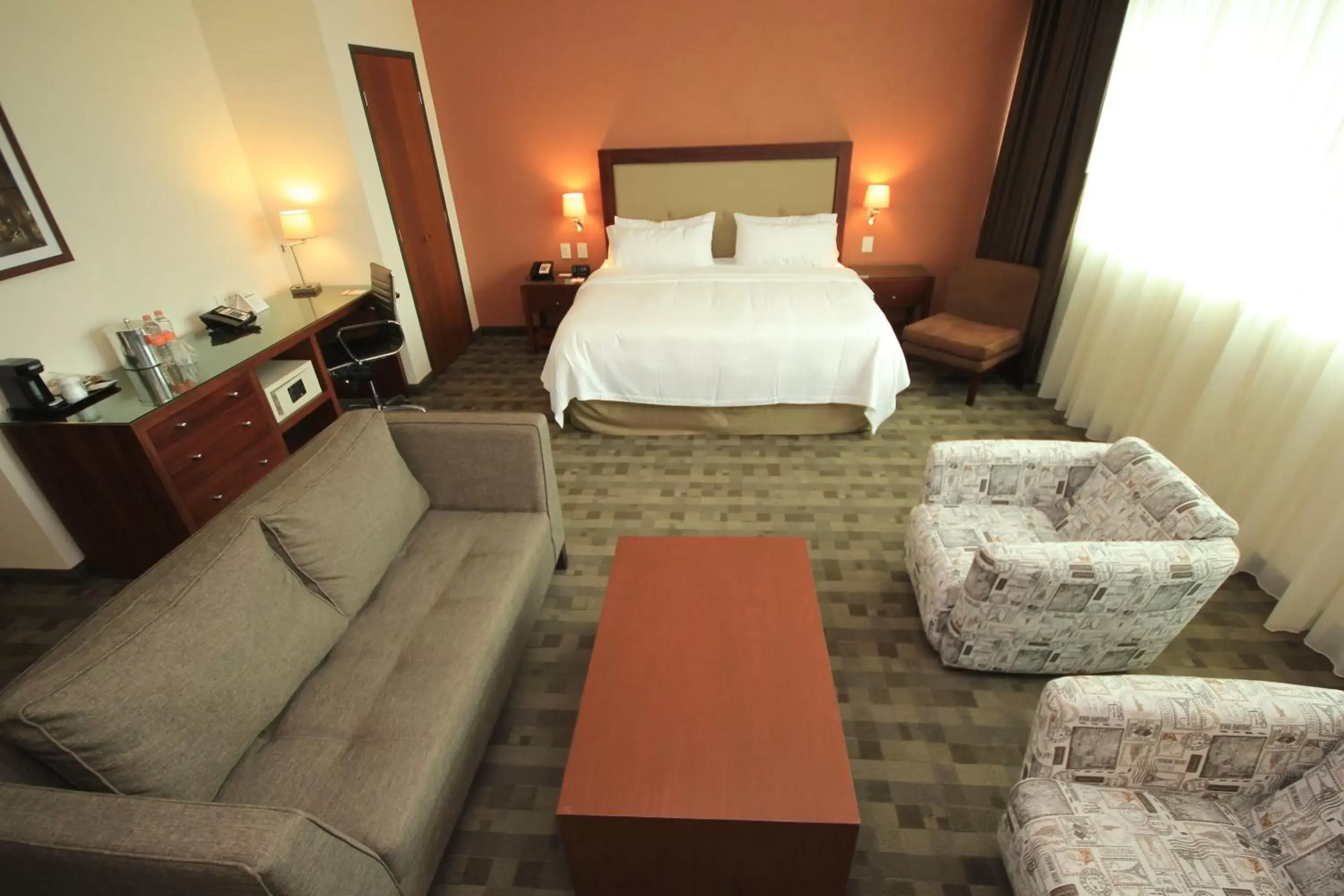 Photo of the whole room, Bed in Holiday Inn & Suites Plaza Mayor, an IHG Hotel