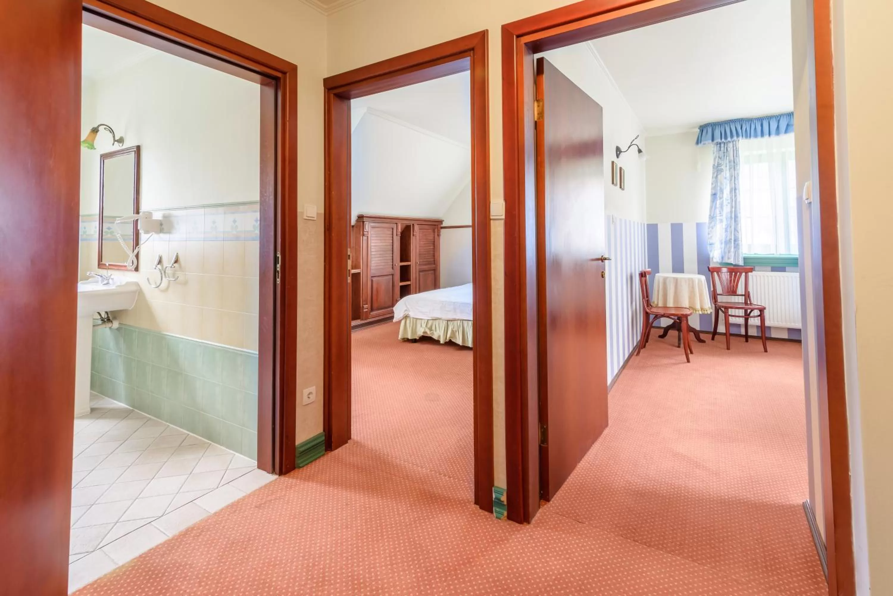 Seating area, Bed in Amax Boutique Hotel