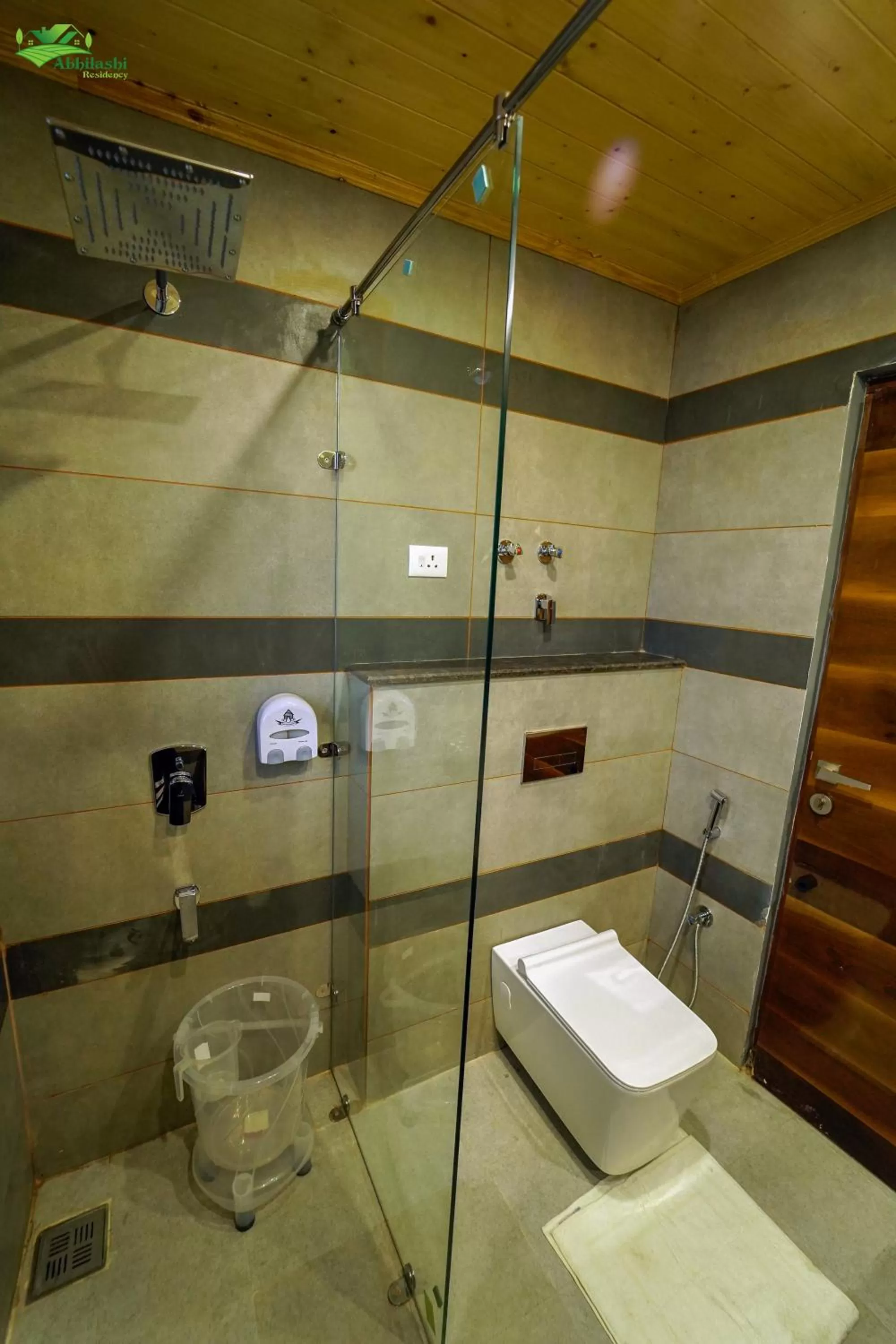 Bathroom in Abhilashi Residency & Spa - Centrally Heated & Air Cooled