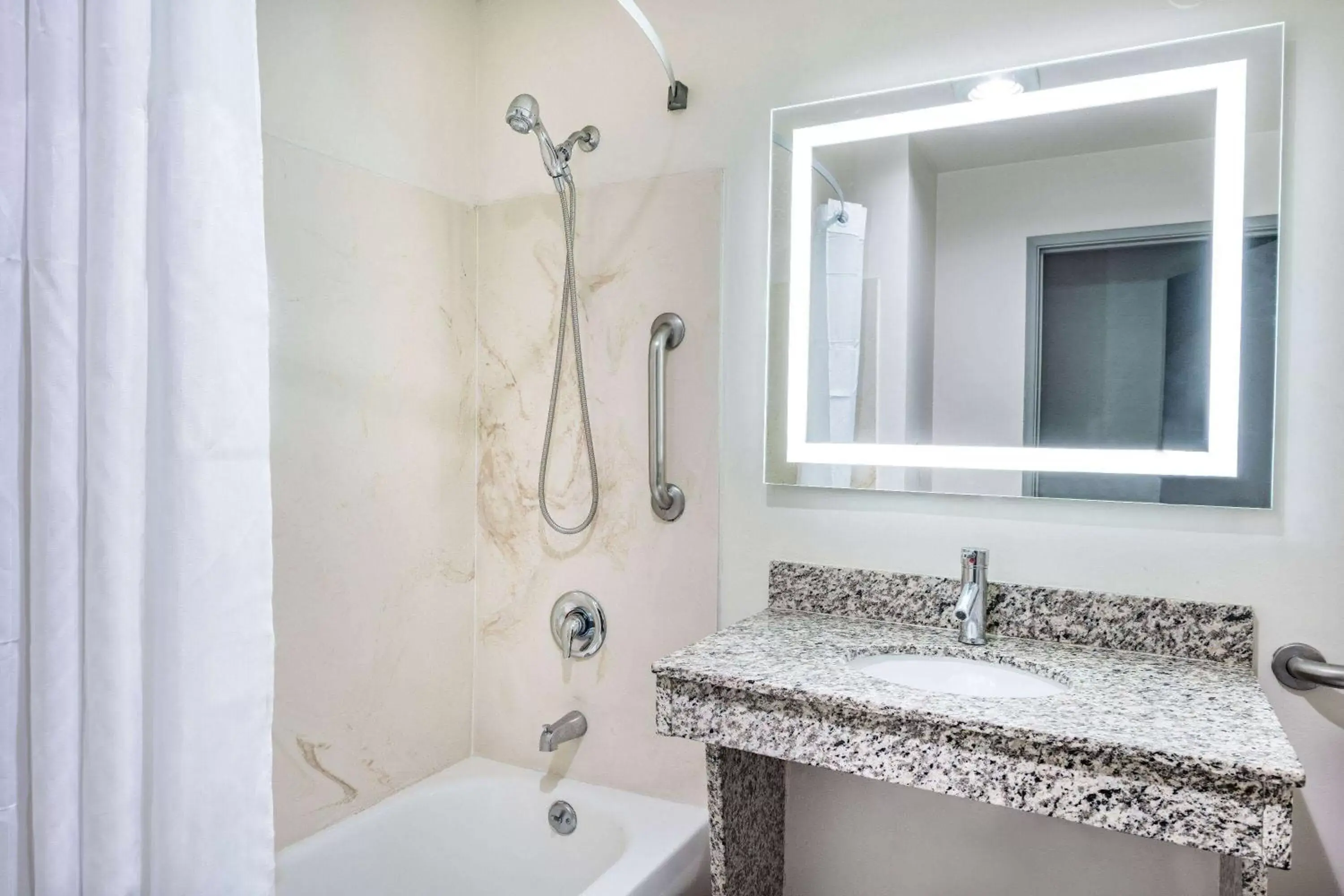 Bathroom in Ramada by Wyndham Bakersfield