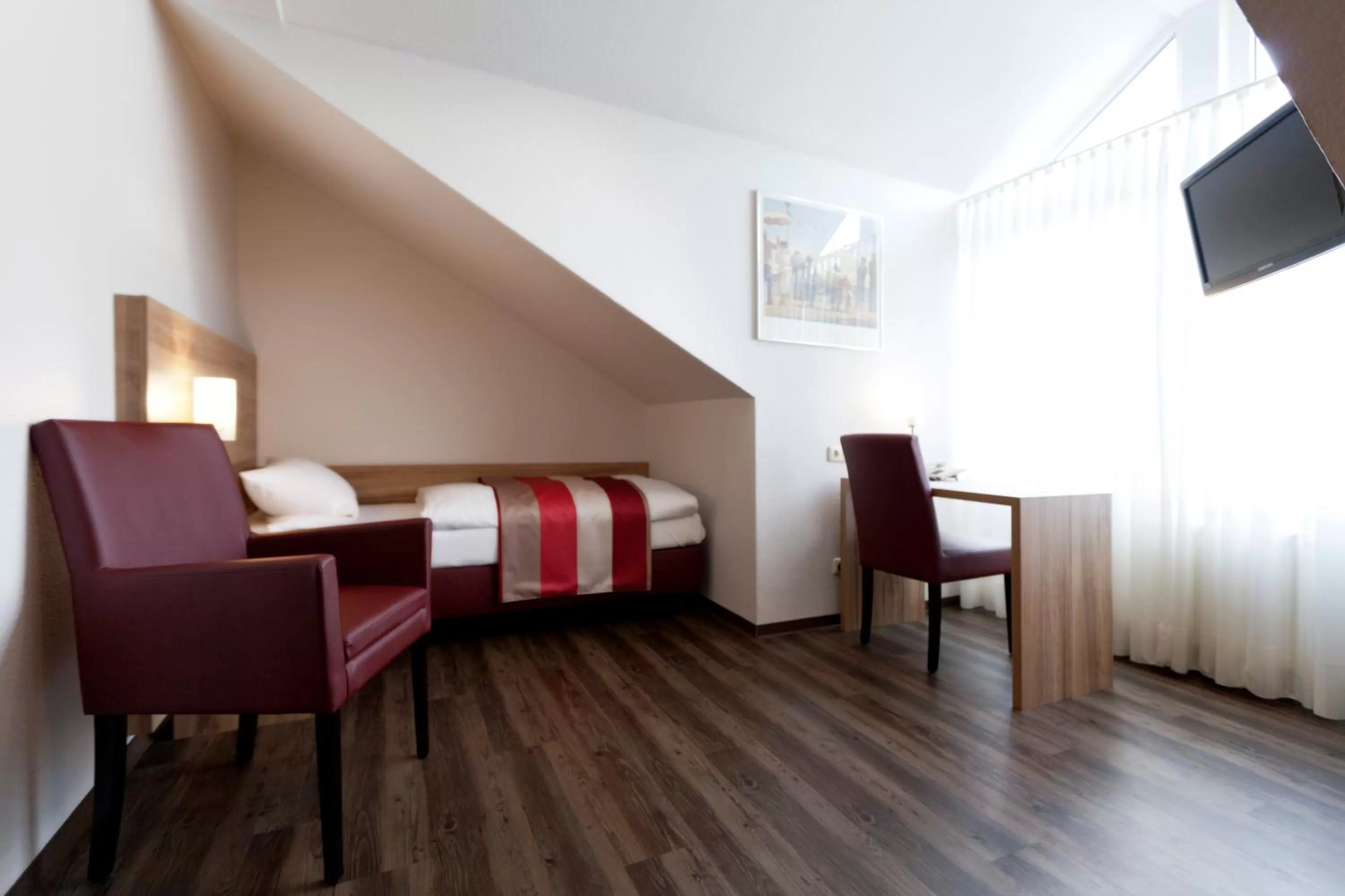 Photo of the whole room, Seating Area in Adolphs Hotel