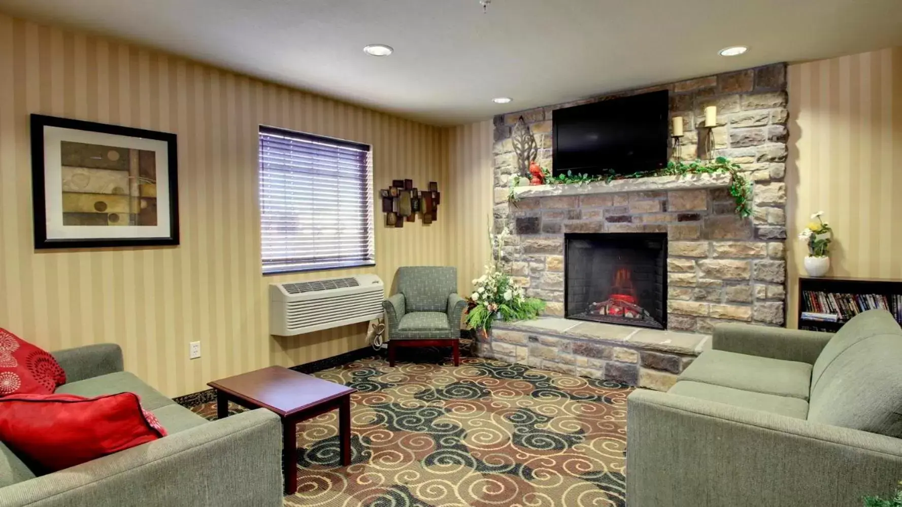 Communal lounge/ TV room, Seating Area in Cobblestone Hotel - Wayne