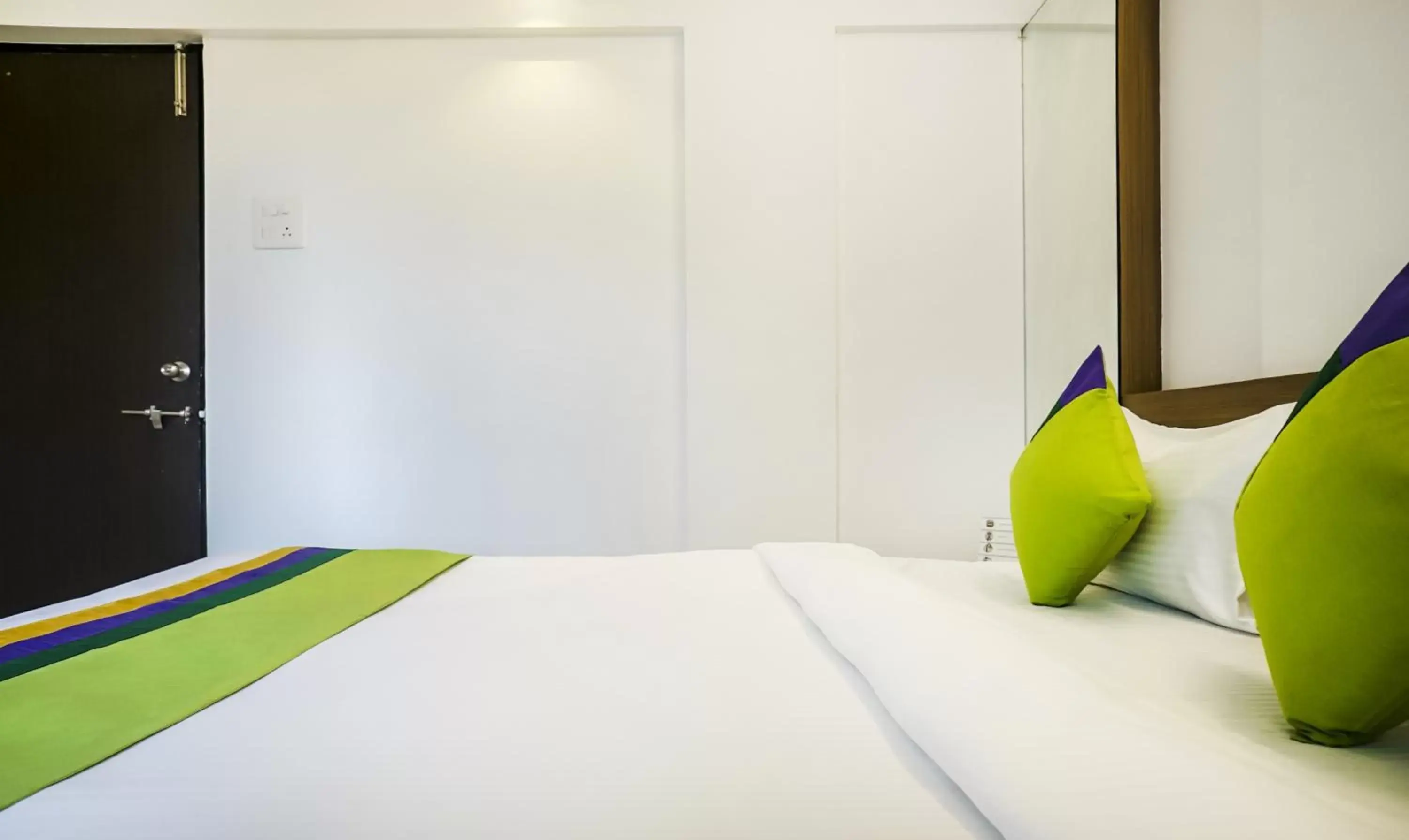 Bed in Treebo Luxe Suite, Shivaji Nagar Bed in Treebo Luxe Suite, Shivaji Nagar