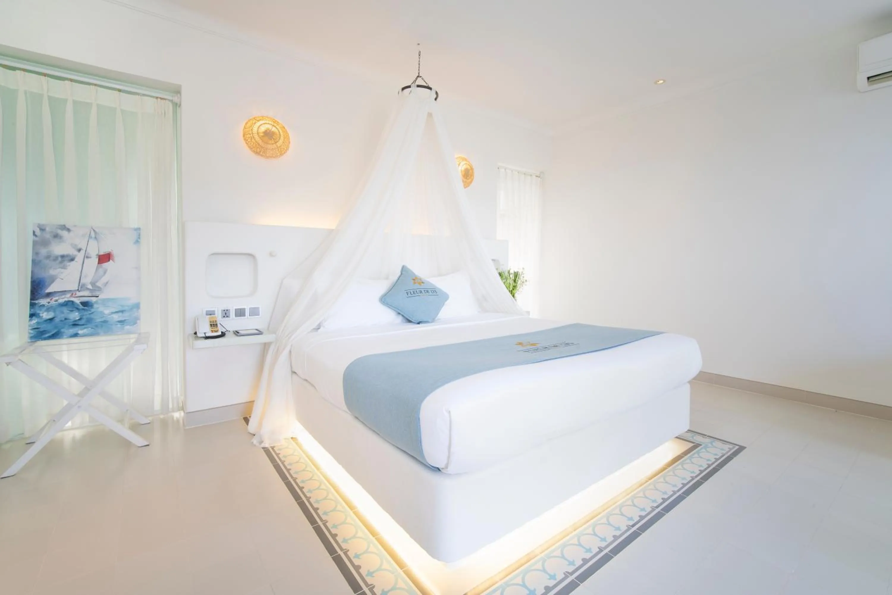 Bed in Fleur de Lys Resort & Spa Long Hai