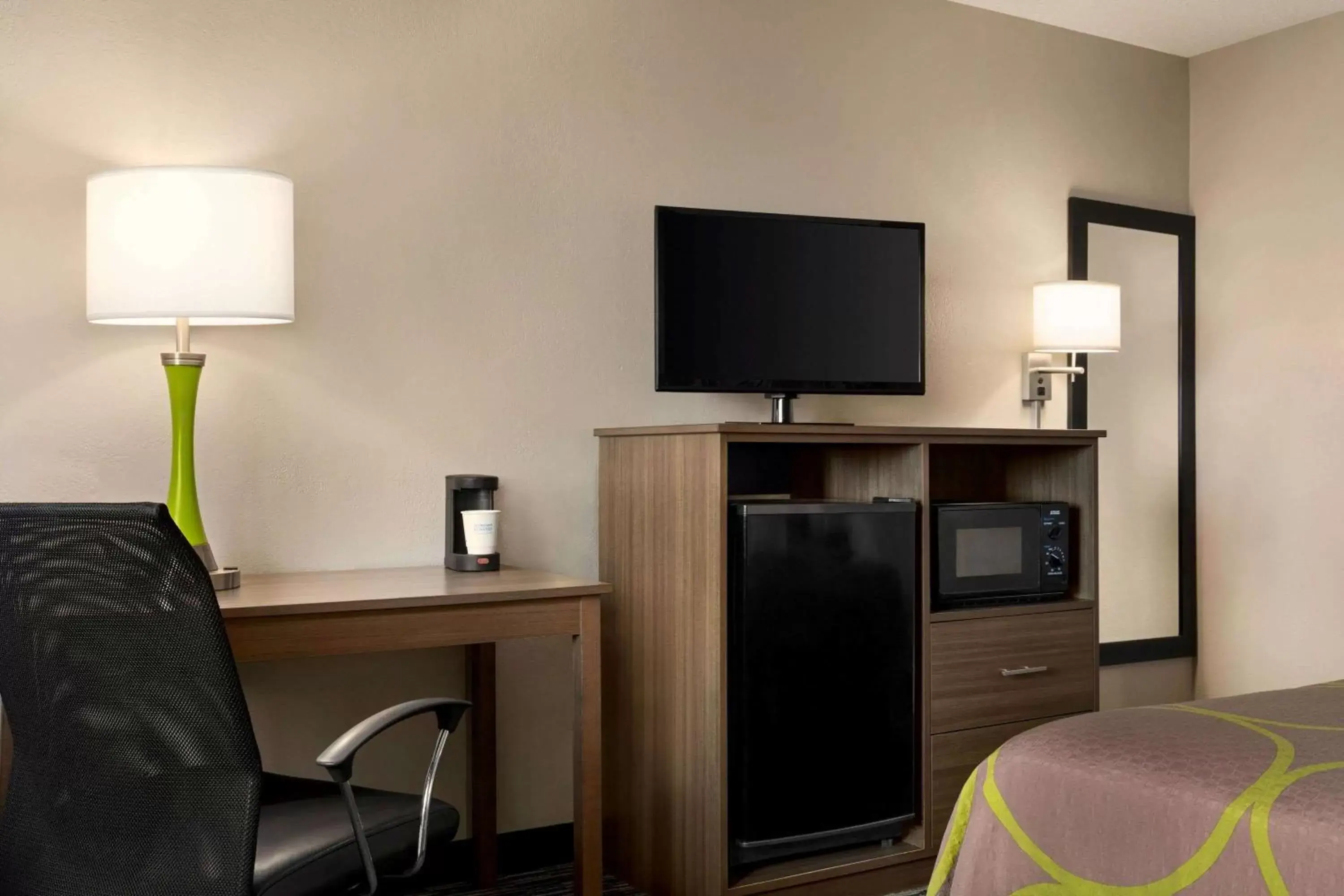 Photo of the whole room, TV/Entertainment Center in Super 8 by Wyndham Joliet I-55 N/Chicago