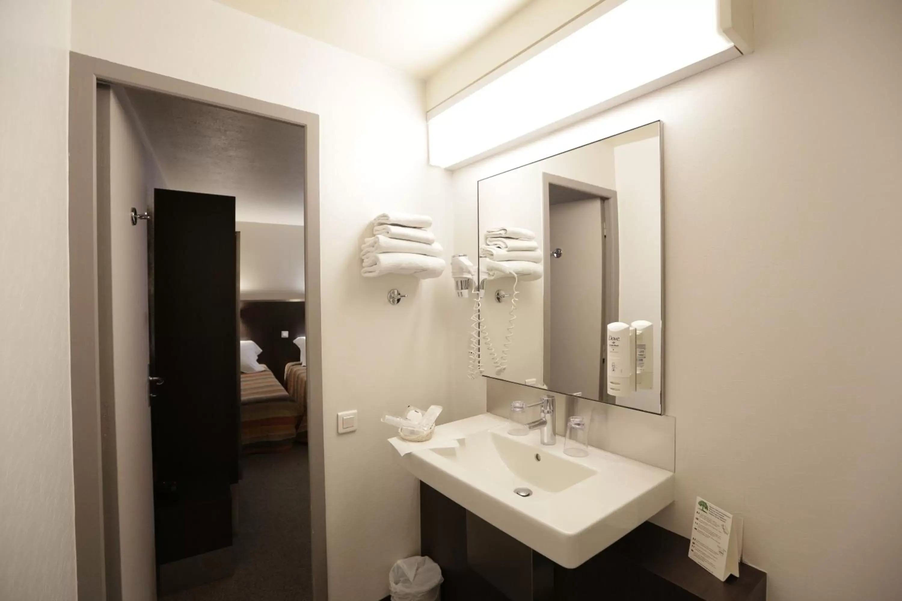 Bathroom in Hôtel Au Petit Caporal
