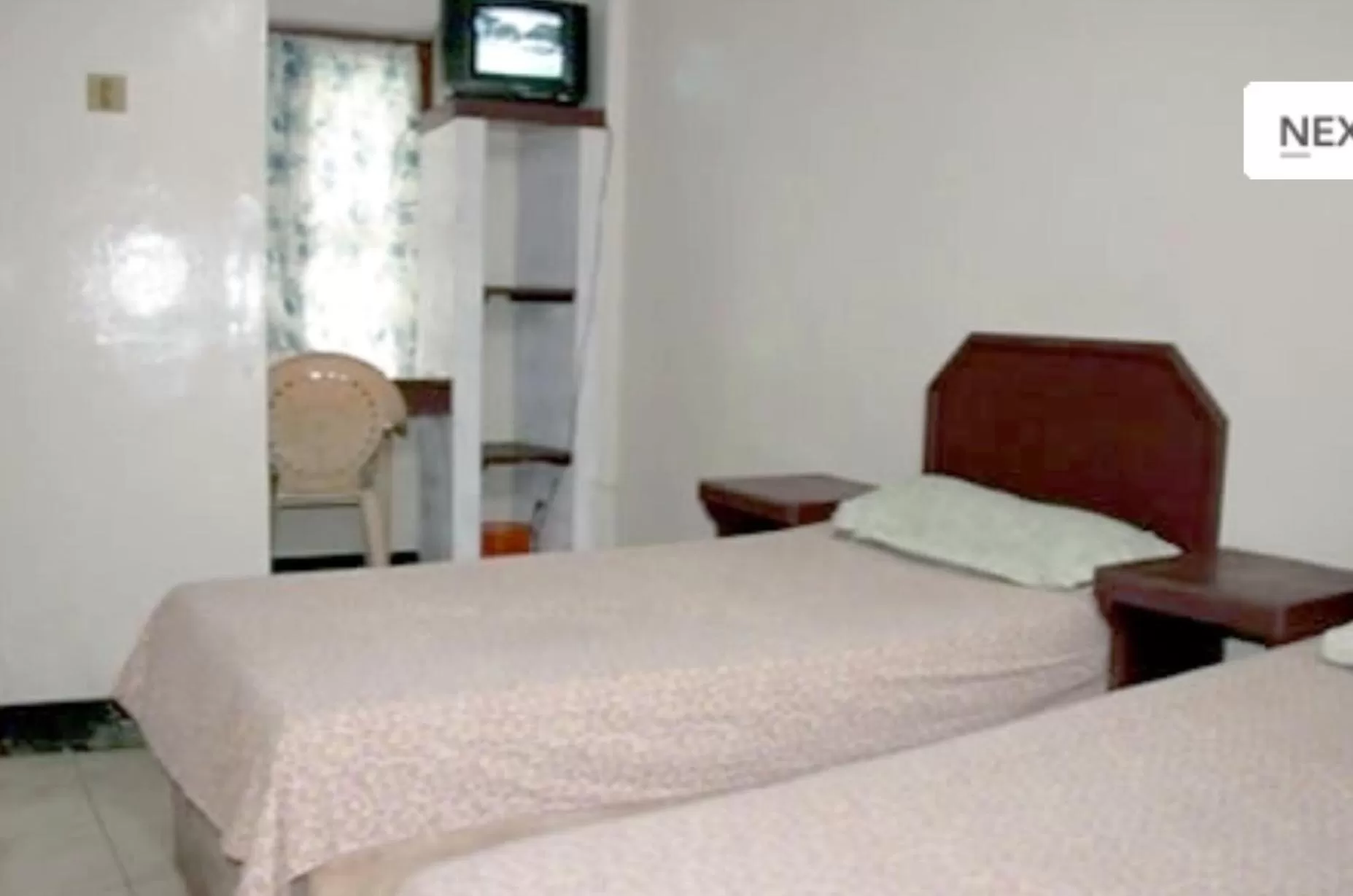 Photo of the whole room, Bed in Anandan Tourist Home