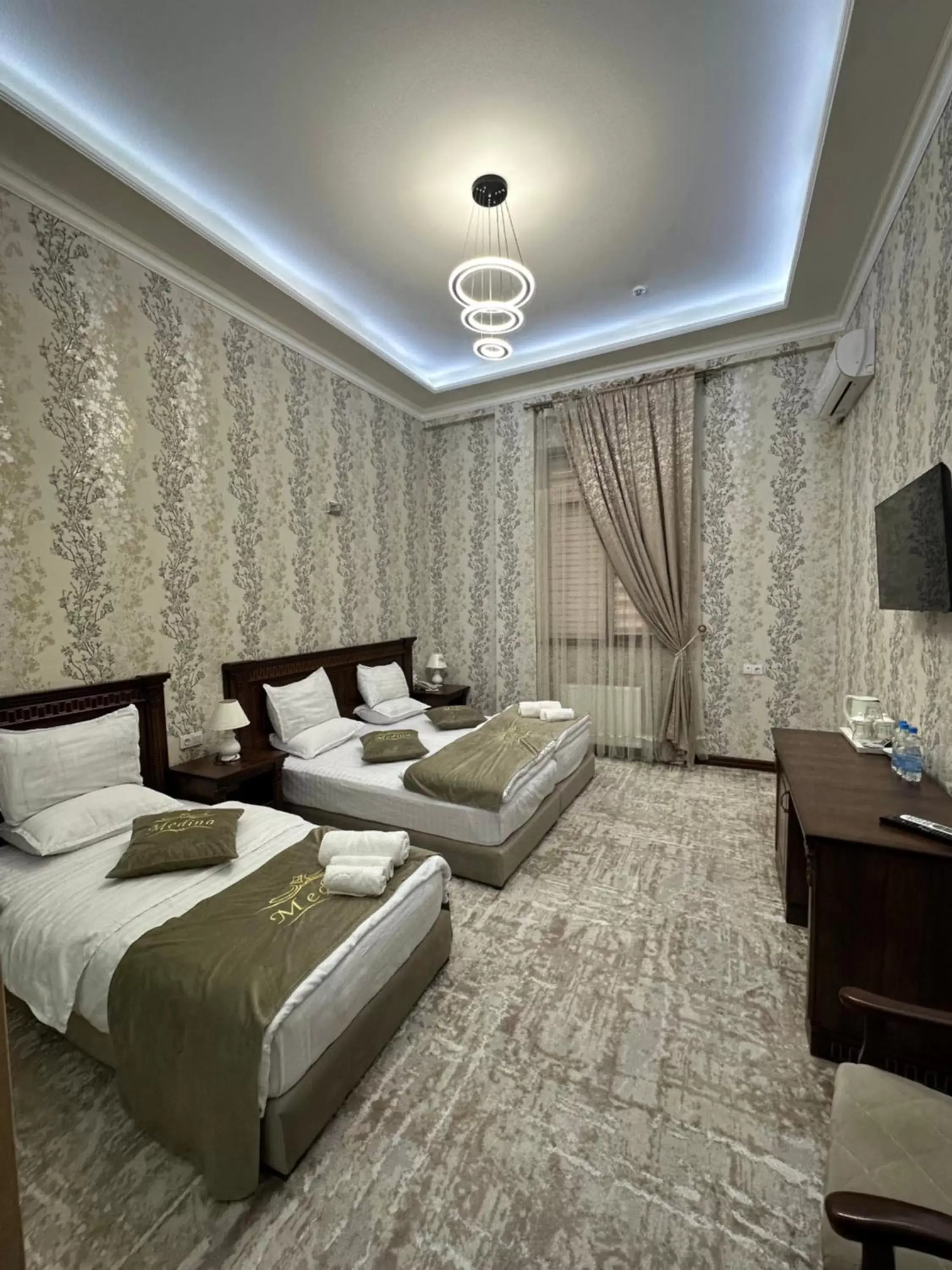 Bed in Medina Hotel Samarkand