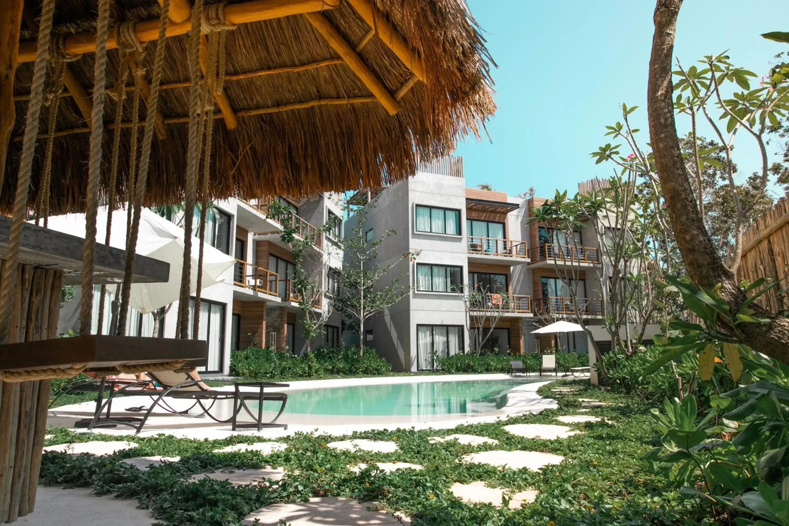 Property building, Swimming Pool in Luxury Condos Macondo Tulum