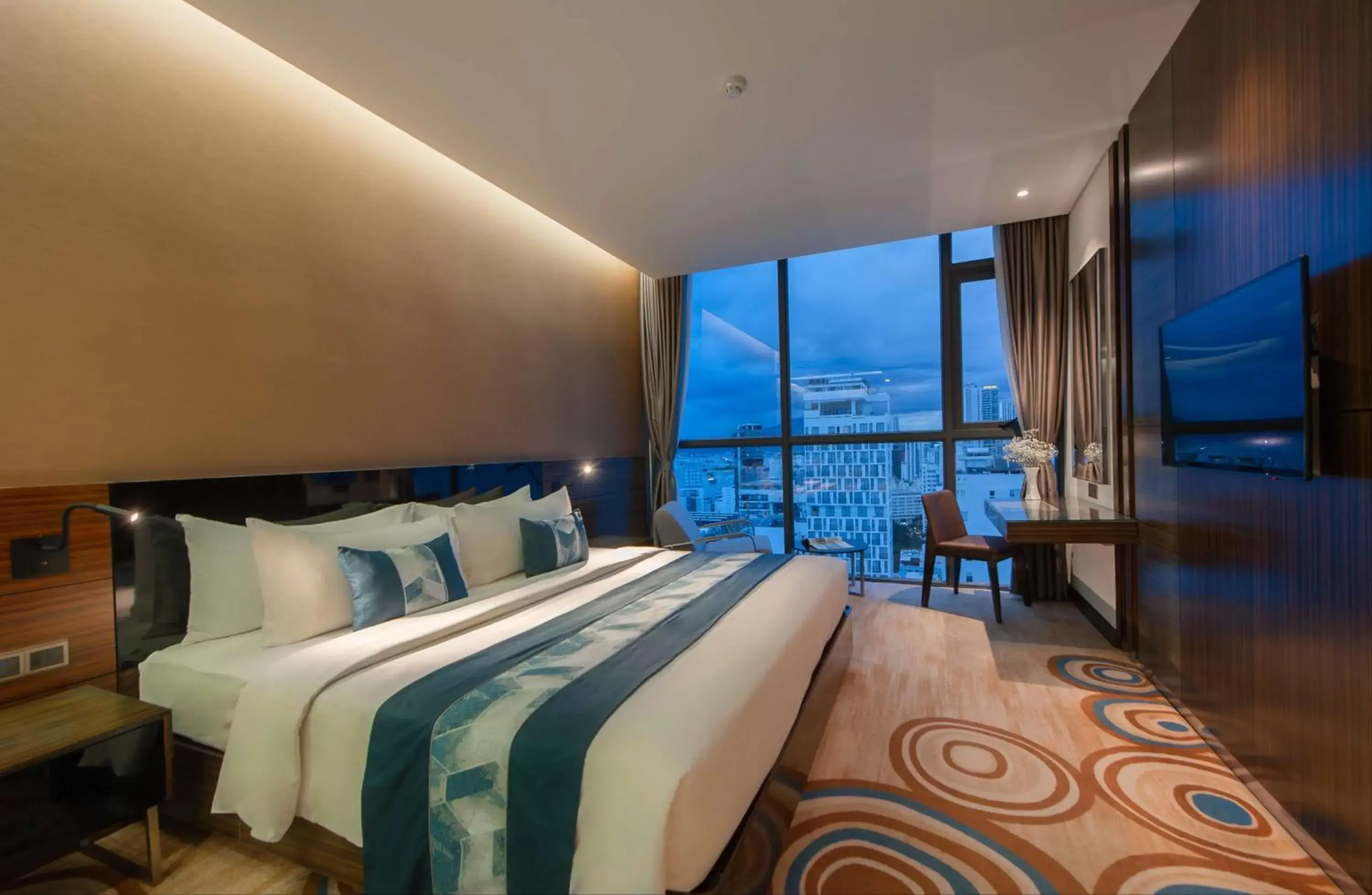 Bed in Queen Ann Nha Trang Hotel