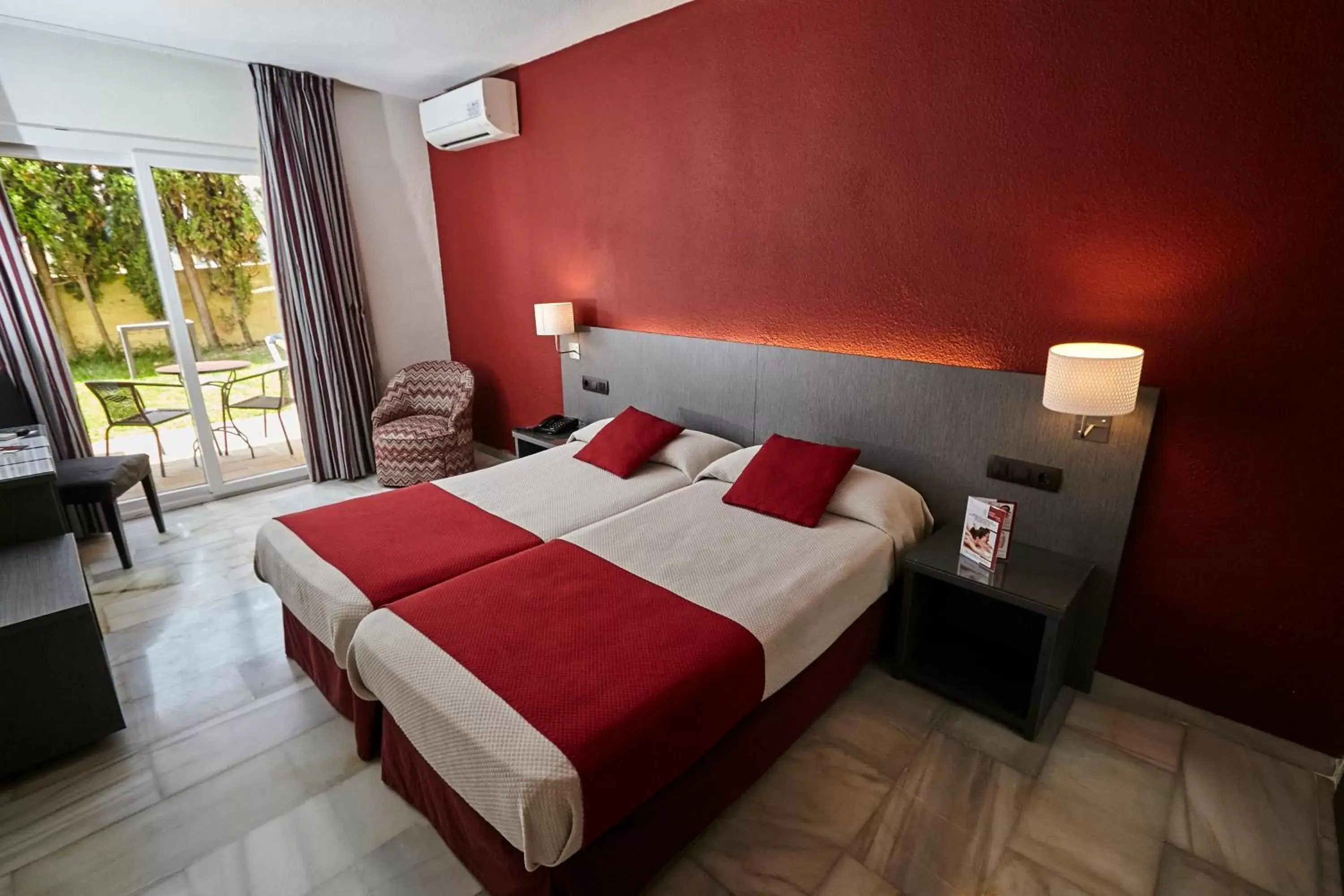 Photo of the whole room, Bed in Hotel Nerja Club Spa by Dorobe
