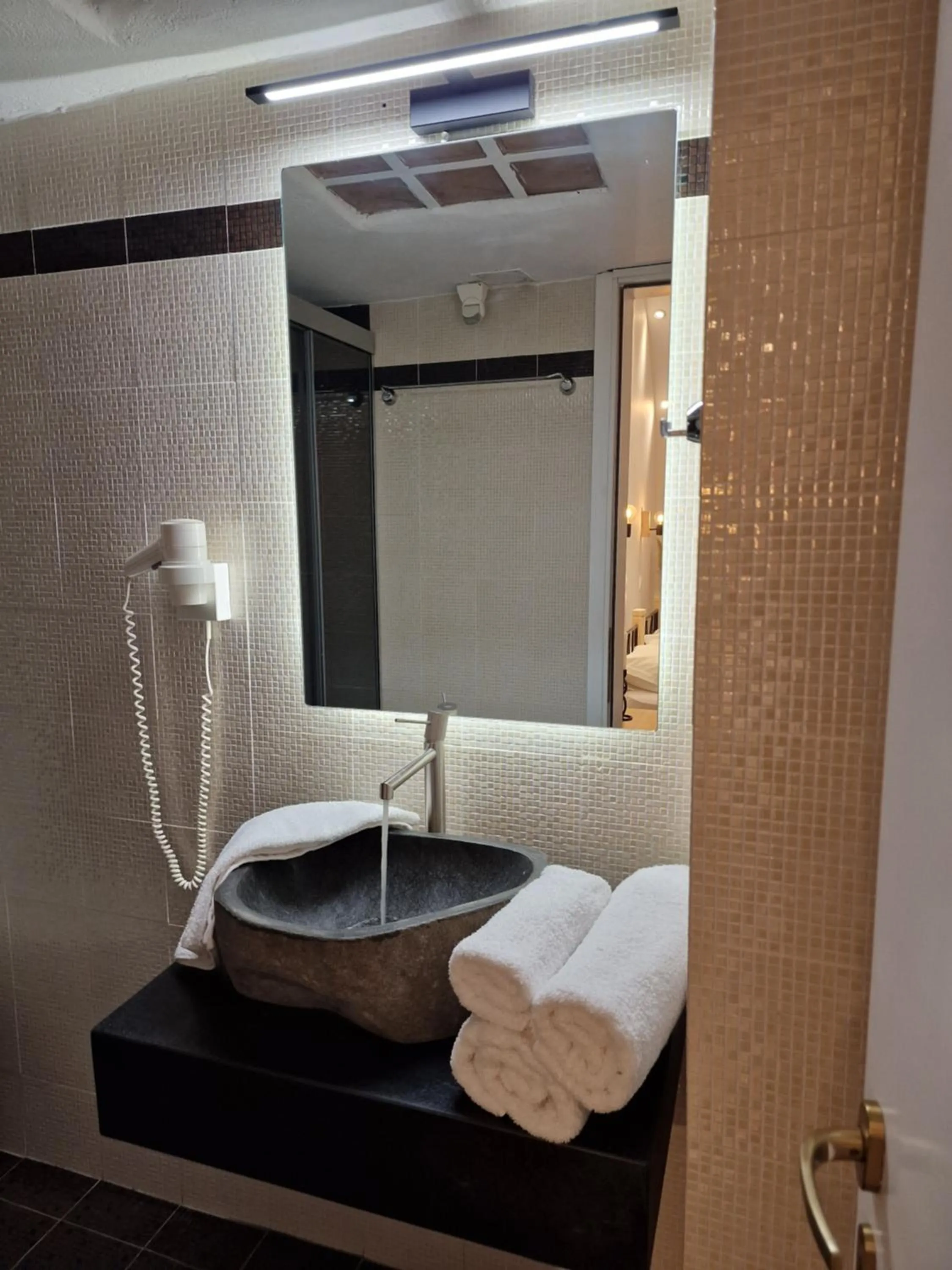 Bathroom in Amerisa Suites & Villa
