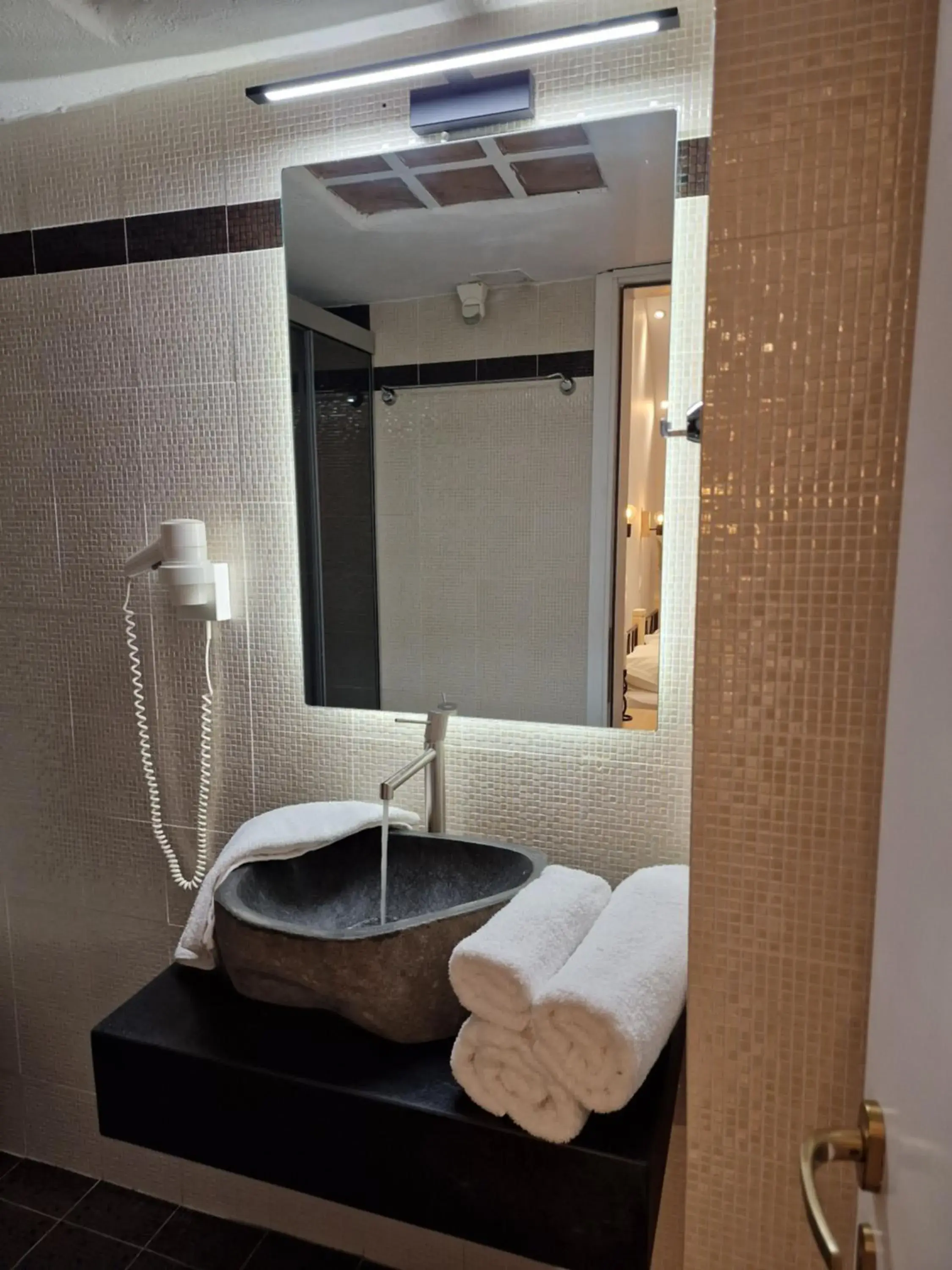 Bathroom in Amerisa Suites