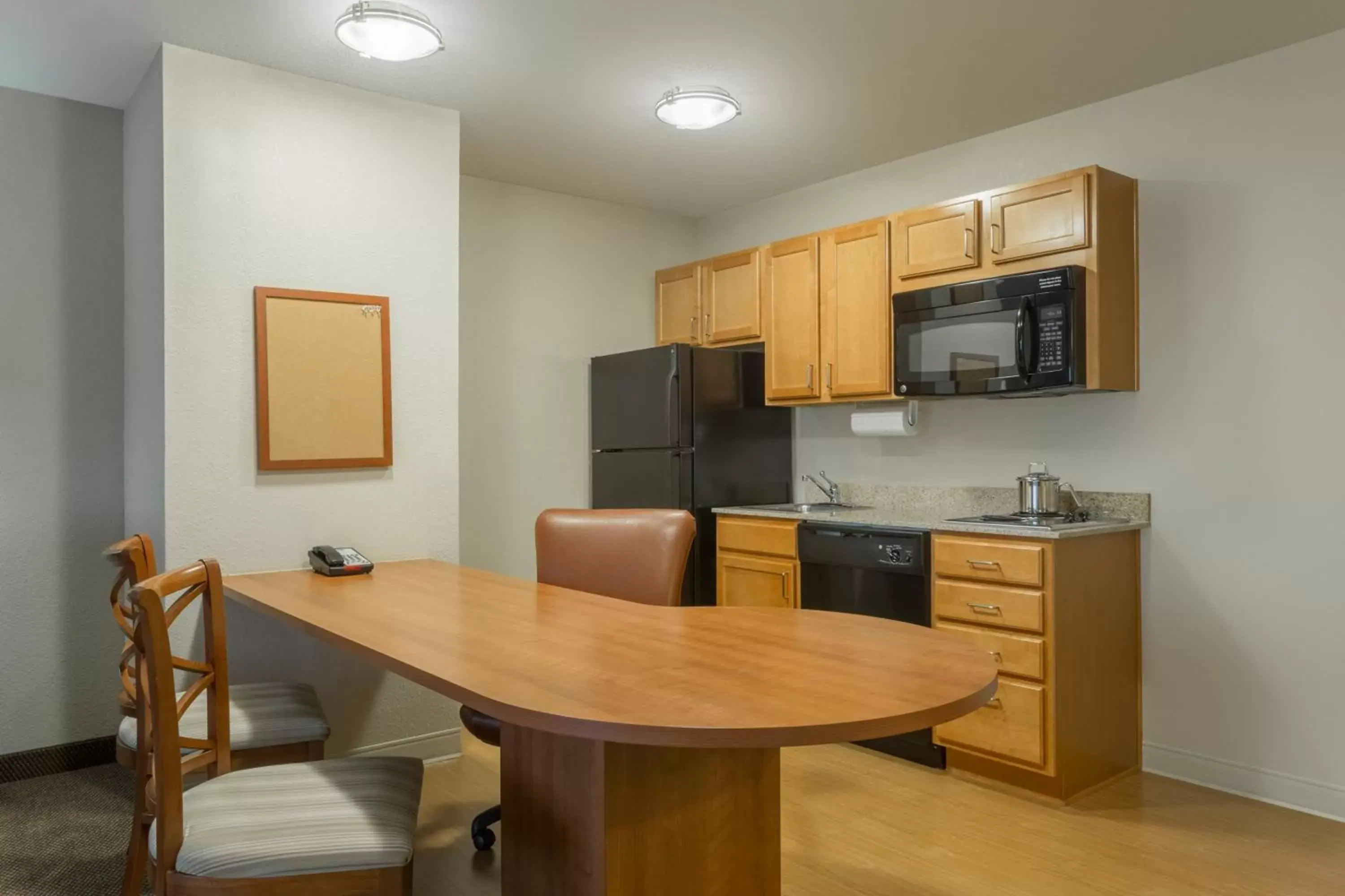 Bedroom, Kitchen/Kitchenette in Candlewood Suites Nogales, an IHG Hotel