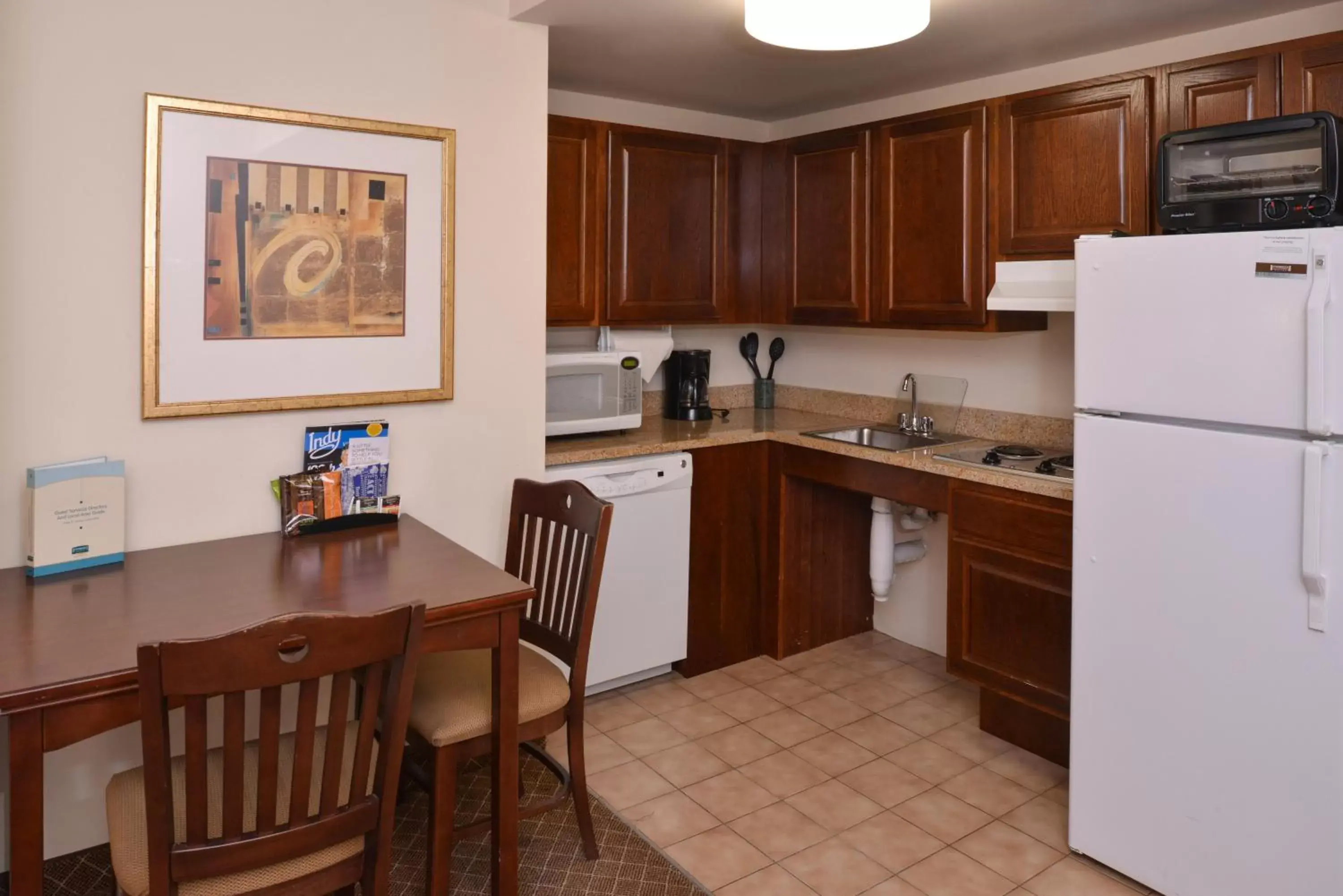 Photo of the whole room, Kitchen/Kitchenette in Staybridge Suites Indianapolis-Airport, an IHG Hotel