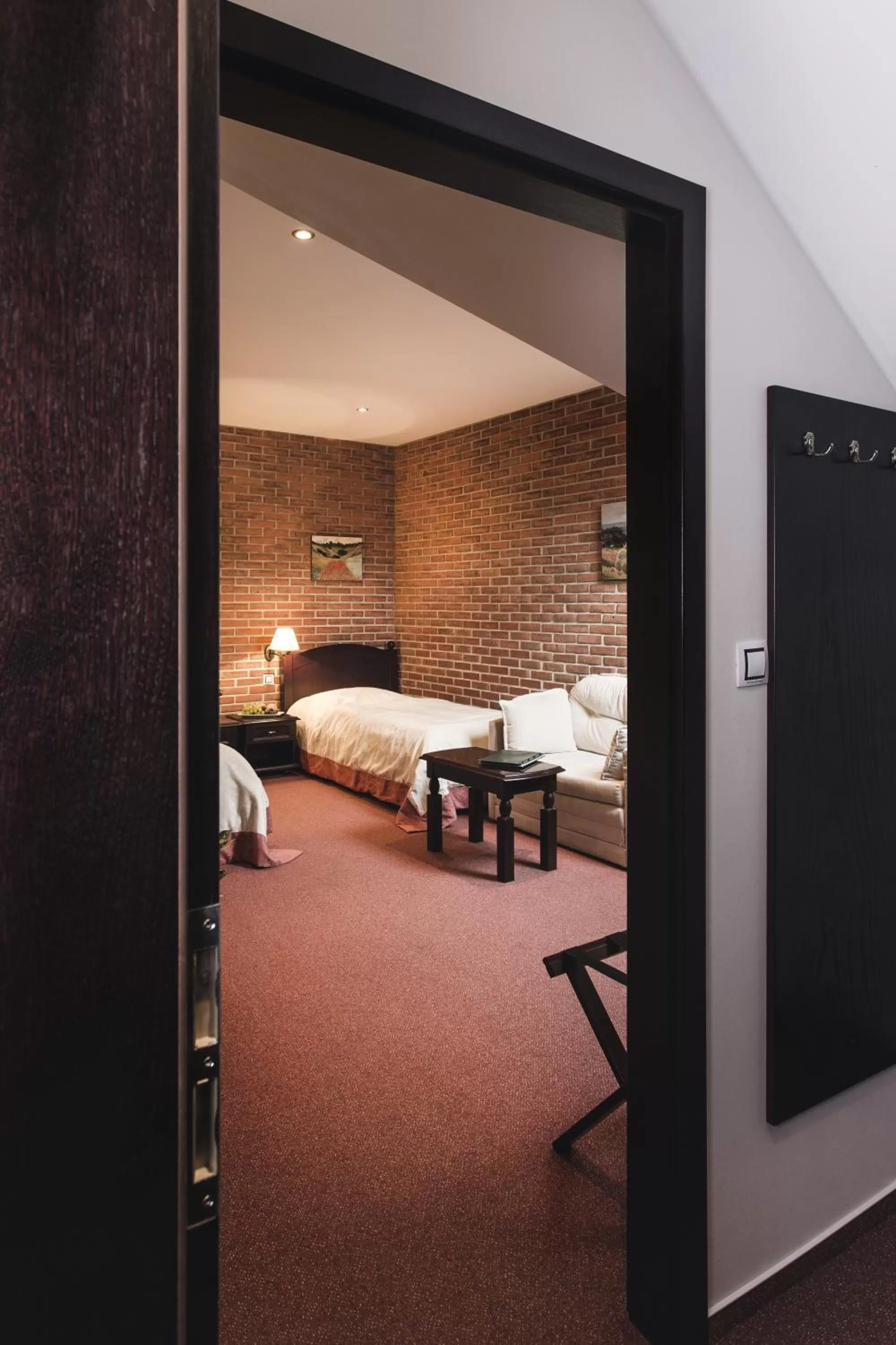 Photo of the whole room, Bed in Hotel Purkmistr