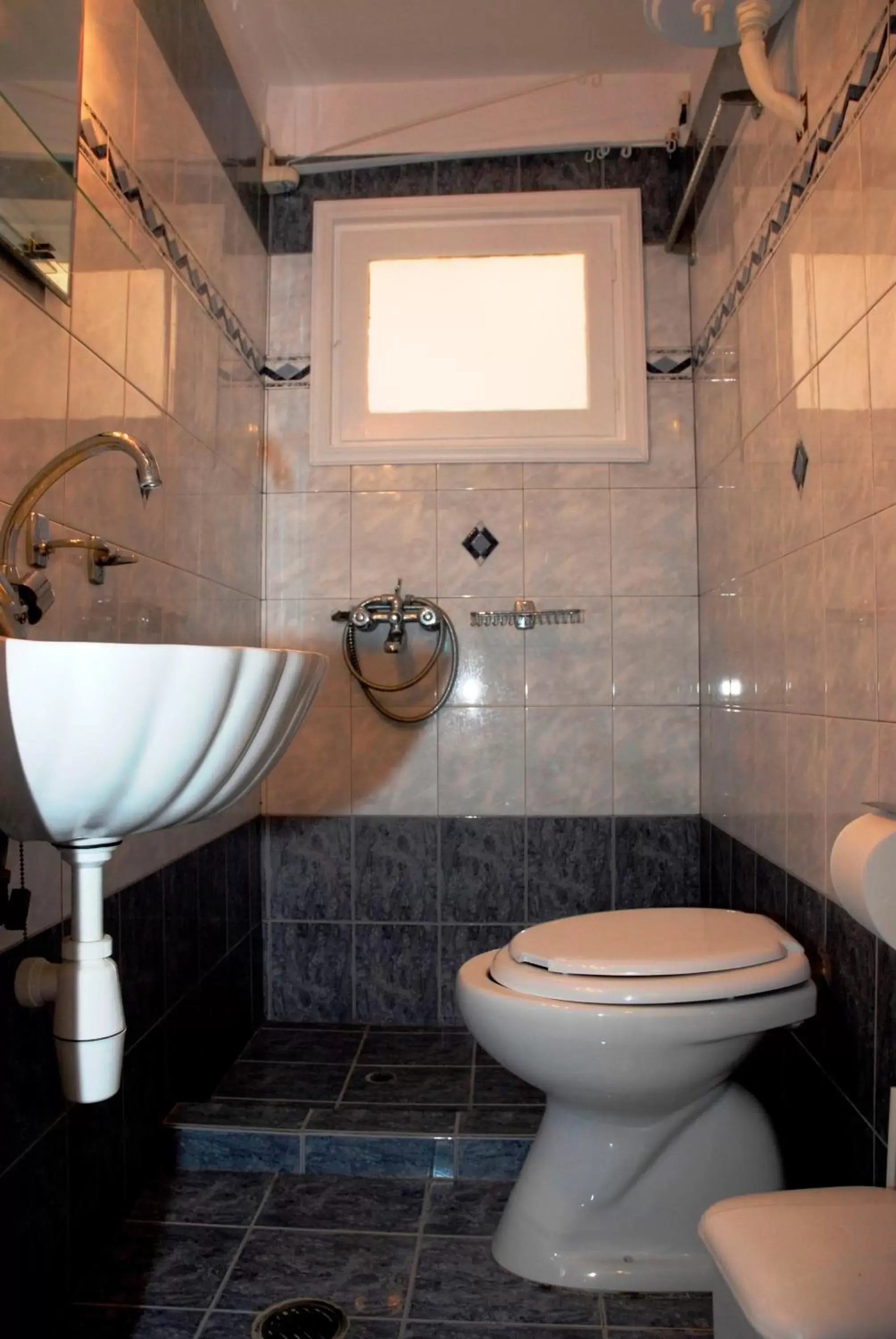 Bathroom in Amaryllis Hotel