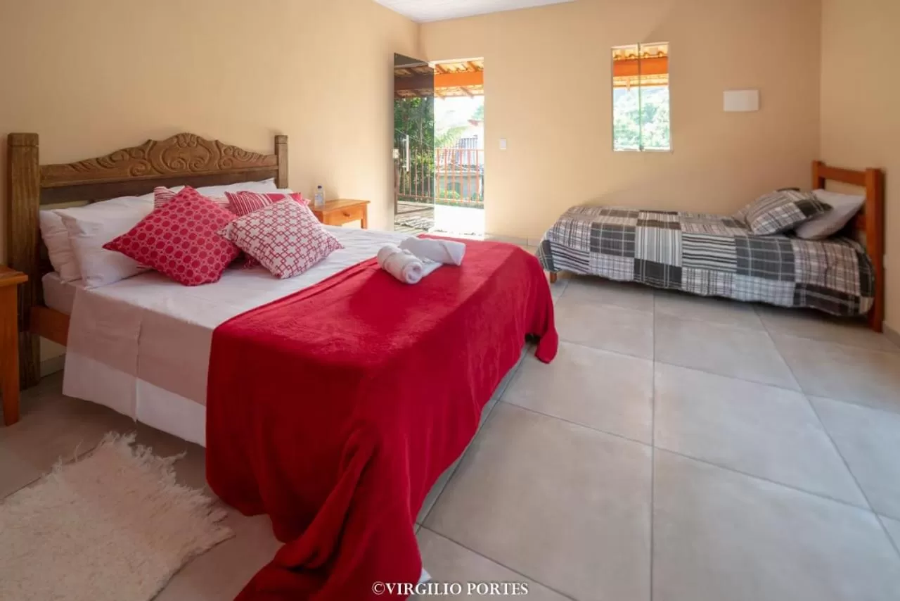 Bed in Pousada Recanto da Lu