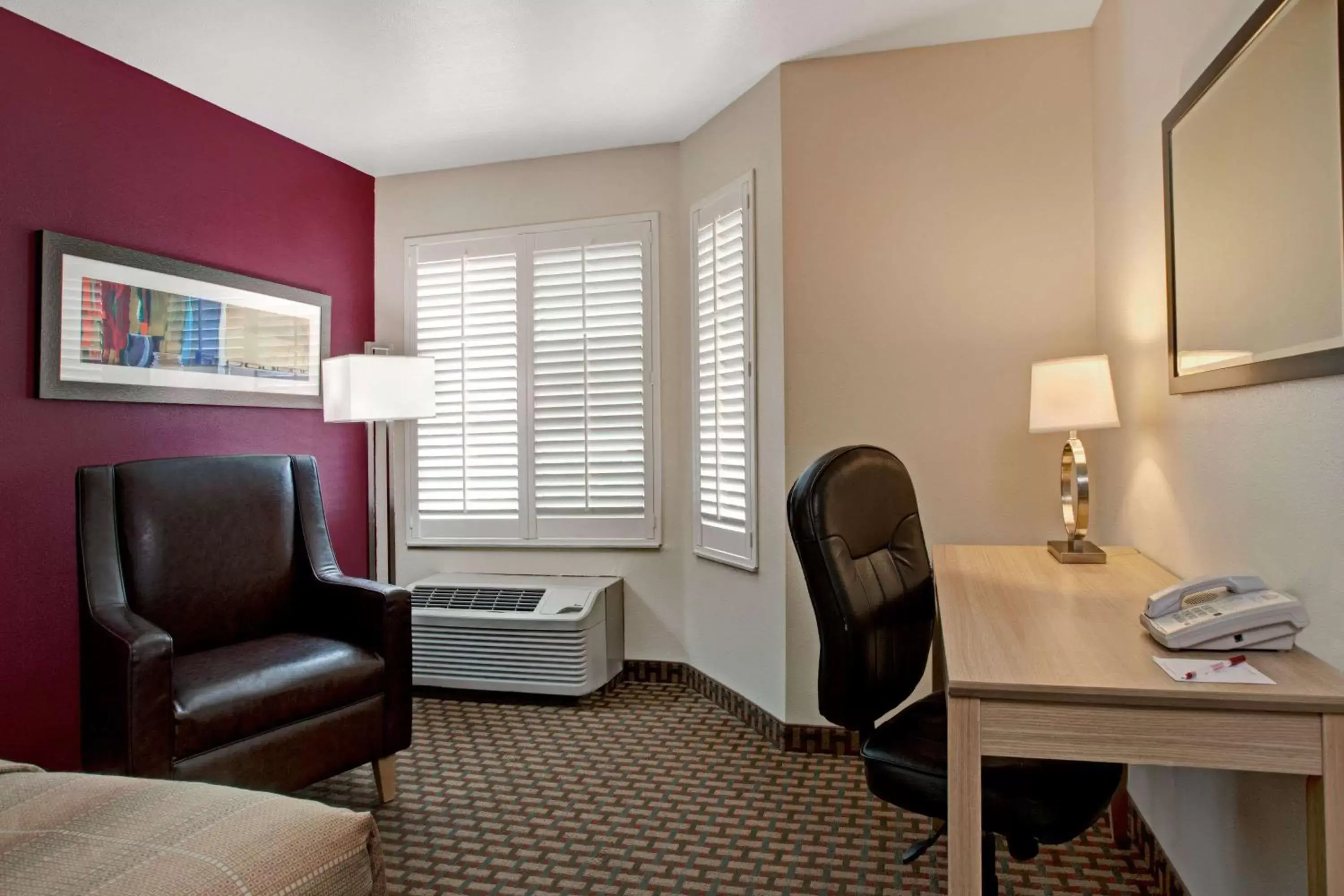 Photo of the whole room, Seating Area in Ramada Limited and Suites San Francisco Airport