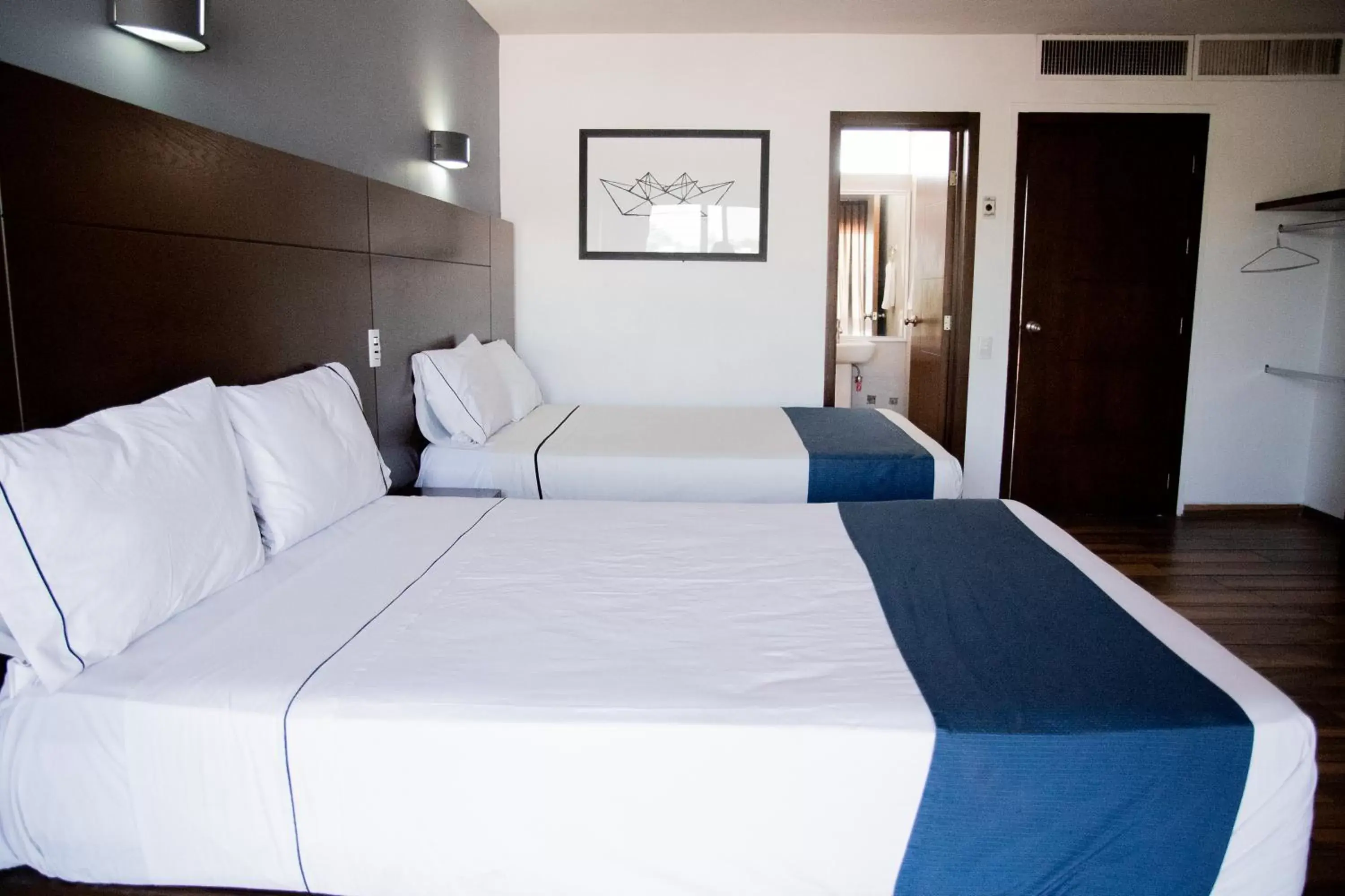 Bed in Hotel Expo Plaza