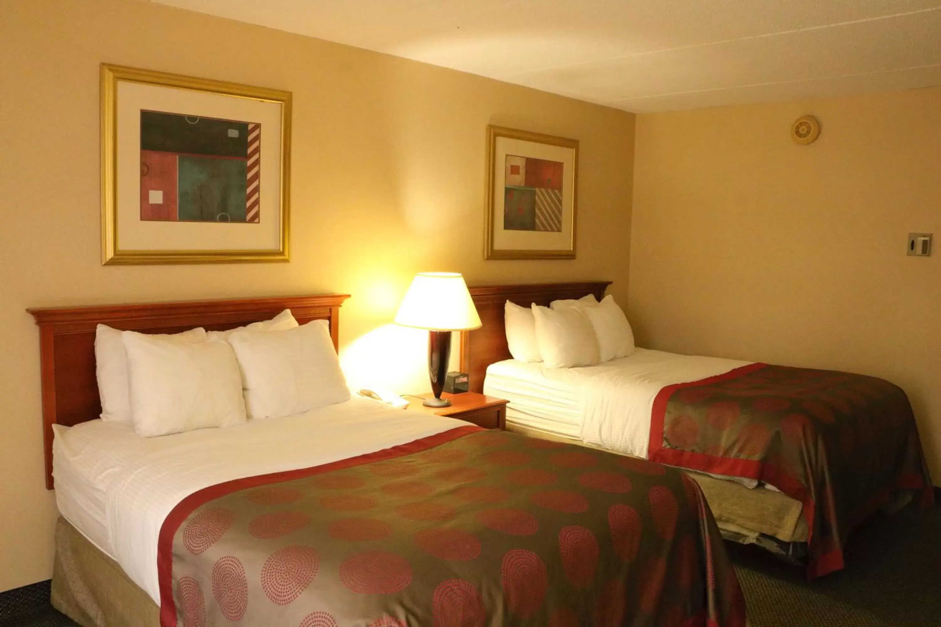 Bed in Ramada by Wyndham Alpena