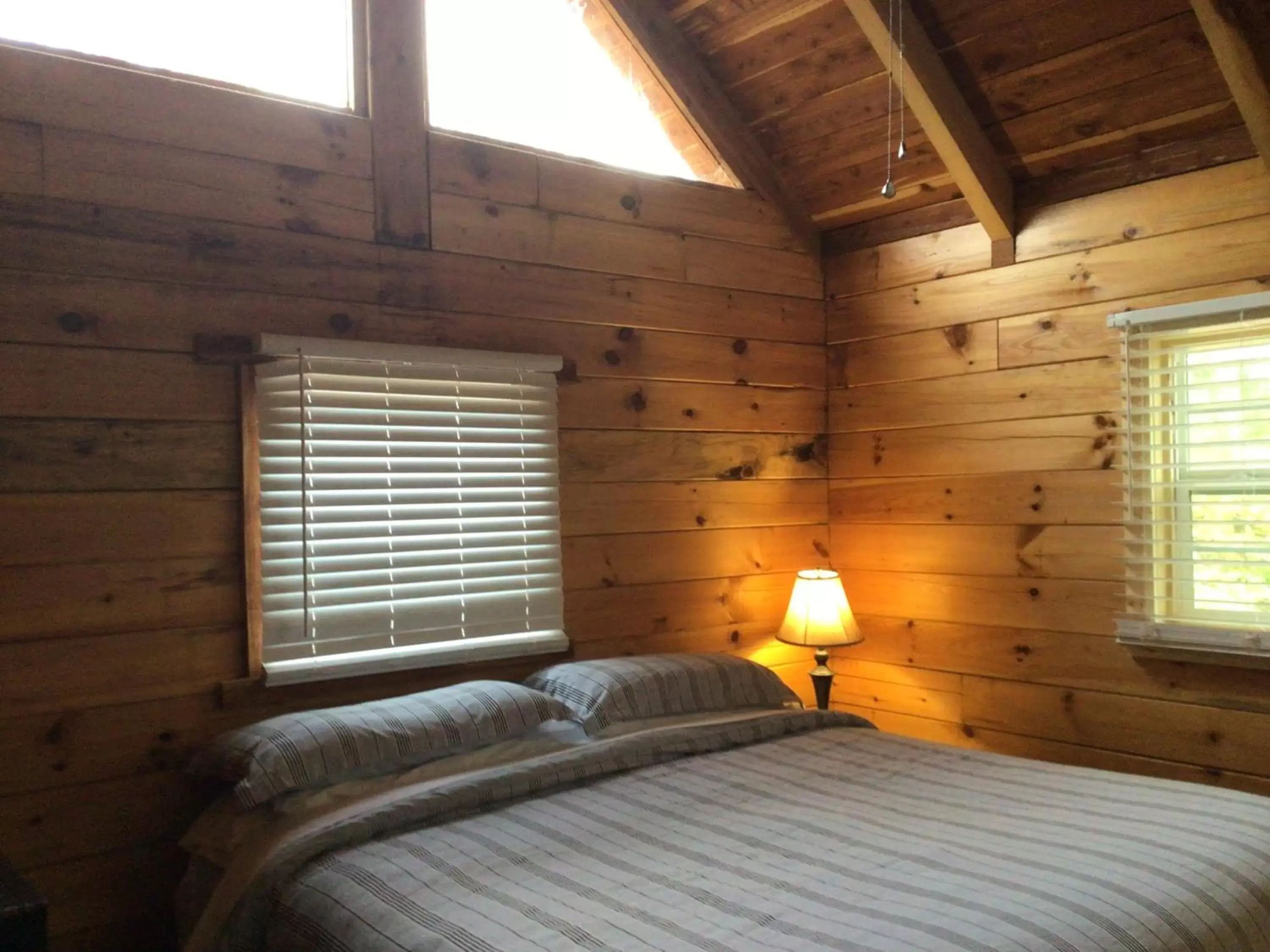 Bedroom, Bed in Kozy Haven Log Cabin Rentals