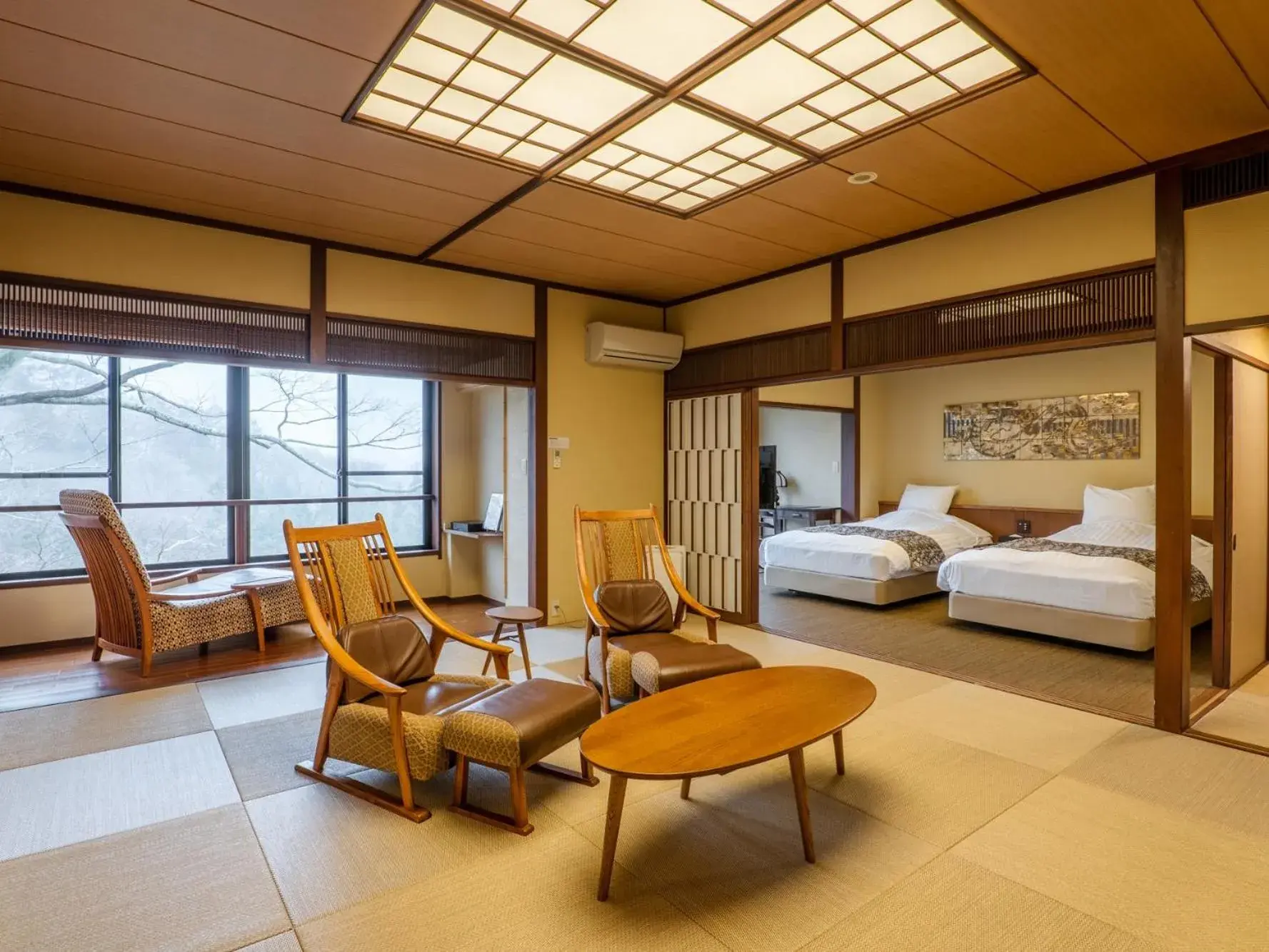 Bed, Seating Area in Kishigon Ryokan